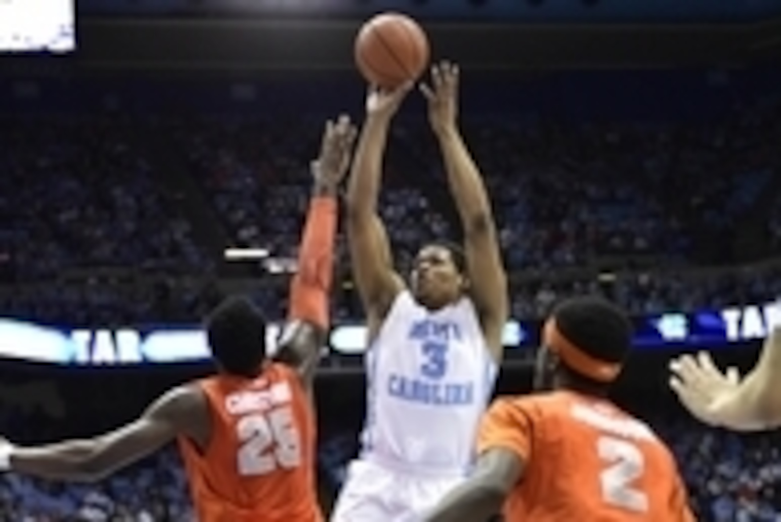 Jan 26, 2015; Chapel Hill, NC, USA; North Carolina Tar Heels forward Kennedy Meeks (3) shoots as Syracuse Orange forward Rakeem Christmas (25) and forward B.J. Johnson (2) defend in the first half at Dean E. Smith Center. Mandatory Credit: Bob Donnan-USA 