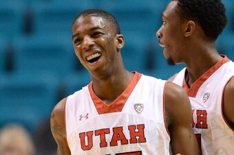 LAS VEGAS, NV - MARCH 12:  Delon Wright #55 of the Utah Utes reacts during a first-round game of the Pac-12 Basketball Tournament against the Washington Huskies at the MGM Grand Garden Arena on March 12, 2014 in Las Vegas, Nevada. Utah won 67-61.  (Photo 