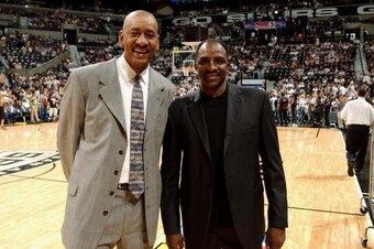 SAN ANTONIO - JUNE 15: NBA legends George Gervin and David Thompson pose before Game six of the 2003 NBA Finals between the New Jersey Nets and the San Antonio Spurs  SBC Center on June 15, 2003 in San Antonio, Texas.  The Spurs won 88-77 and defeated the