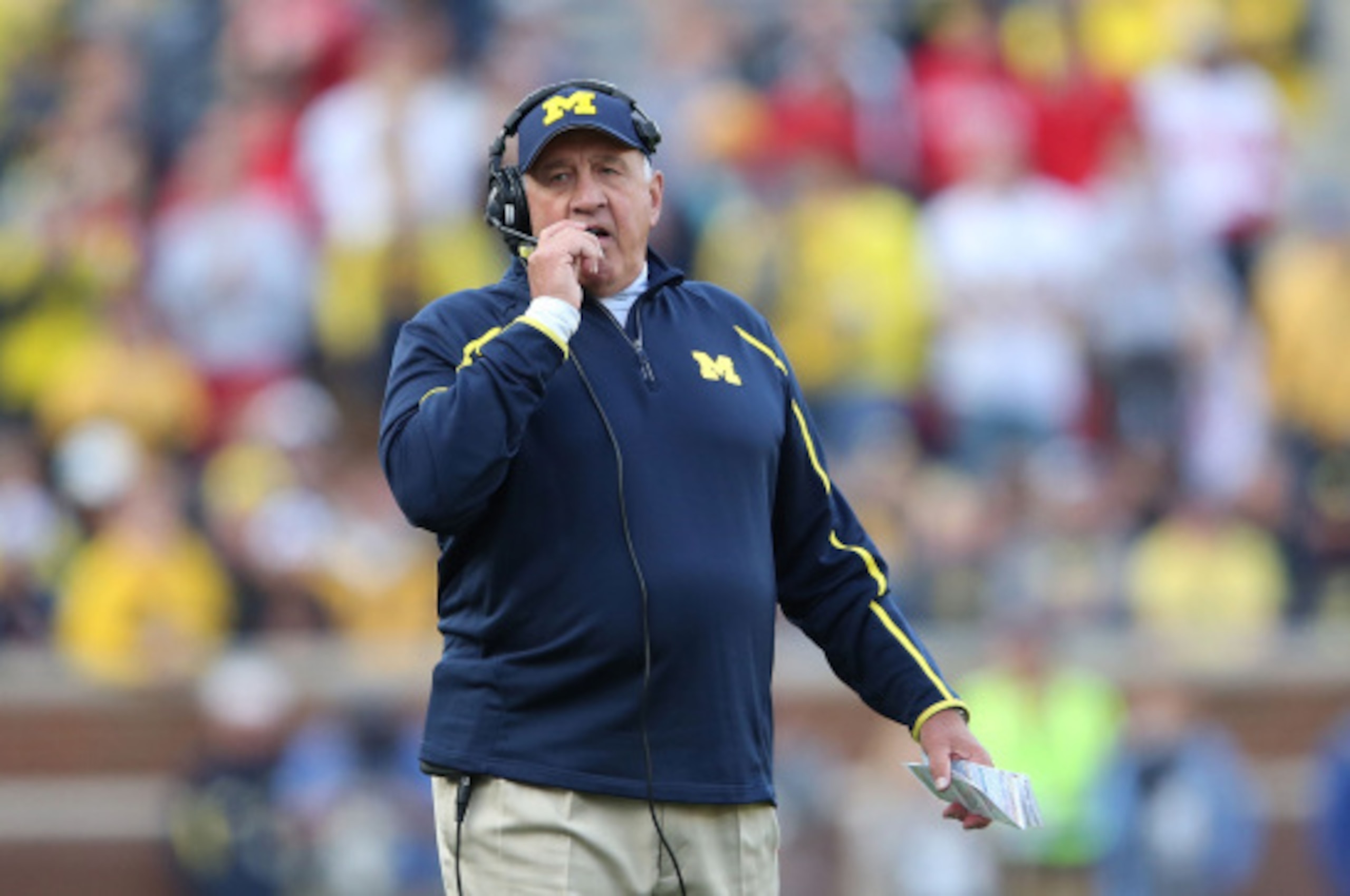 ANN ARBOR, MI - SEPTEMBER 13:  University of Michigan Defensive Coordinator/Linebackers Coach Greg Mattison watches the action during the fourth quarter of the game against the Miami University Redhawks at Michigan Stadium on September 13, 2014 in Ann Arb