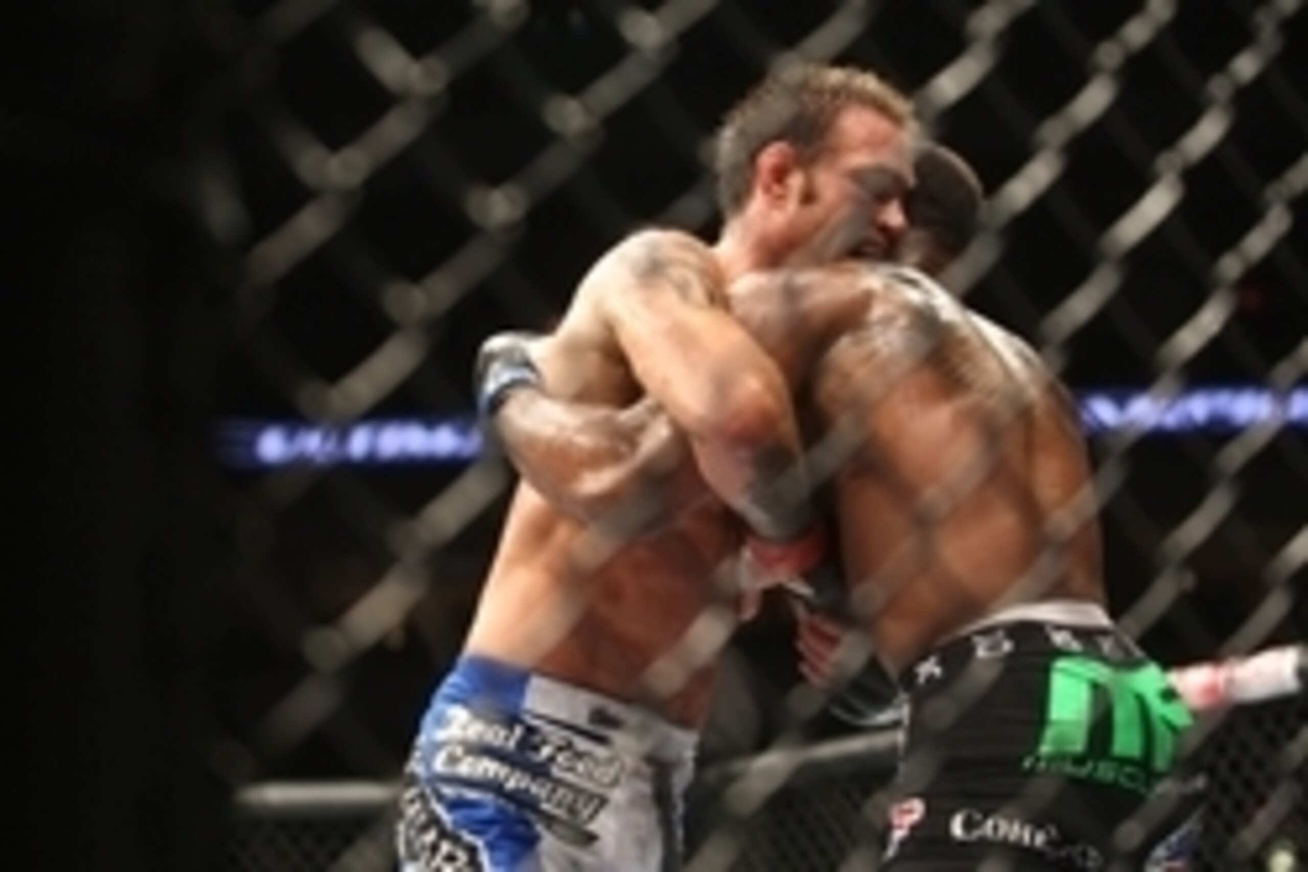 June 15, 2013; Winnipeg, Manitoba, CAN; Welterweight Jake Shields (blue shorts) puts a hold on Tyron Woodley (black shorts) during UFC 161 at the MTS Center. Mandatory Credit: Bruce Fedyck-USA TODAY Sports June 15, 2013; Winnipeg, Manitoba, CAN; Welterweight Jake Shields (blue shorts) puts a hold on Tyron Woodley (black shorts) during UFC 161 at the MTS Center. Mandatory Credit: Bruce Fedyck-USA TODAY Sports