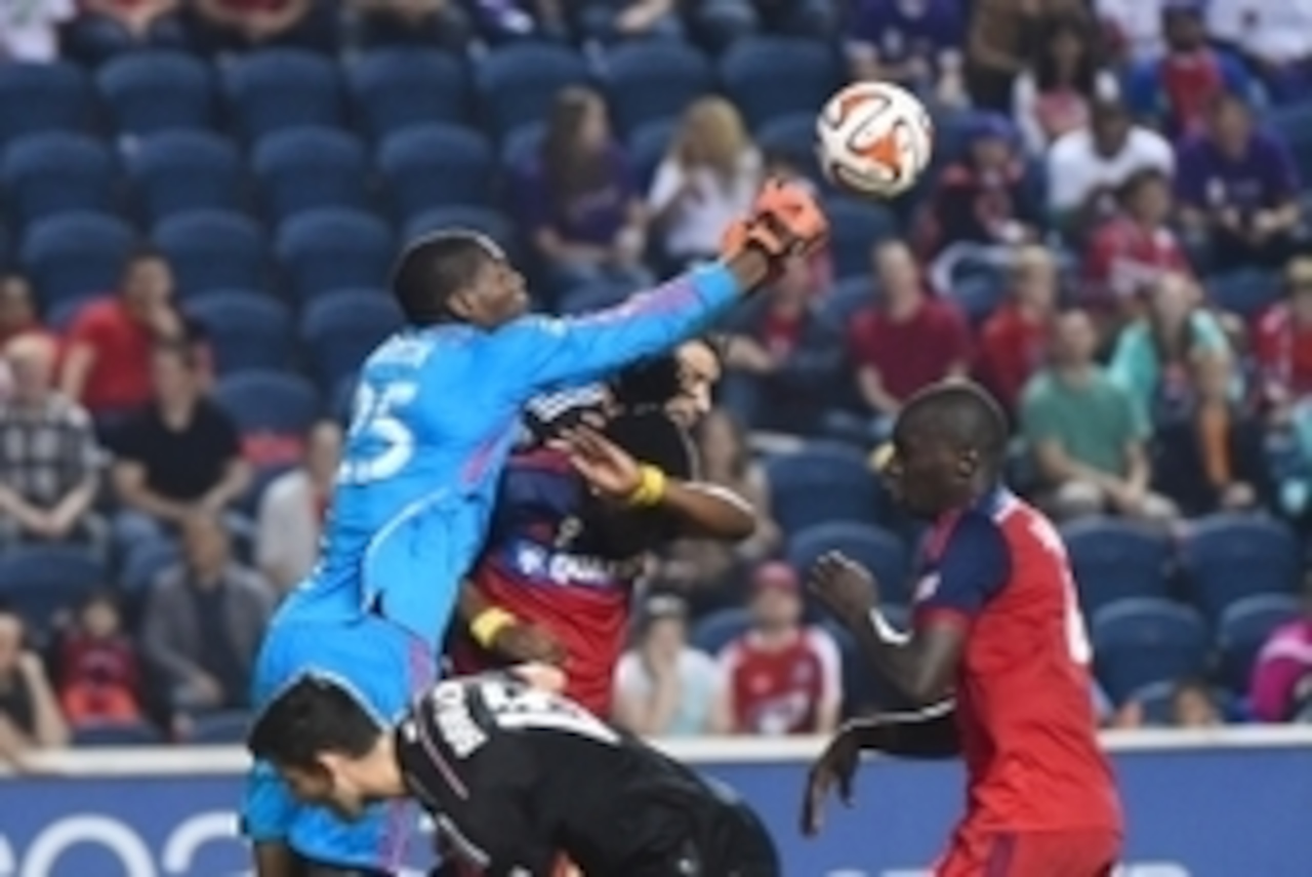 Sep 20, 2014; Chicago, IL, USA;  Chicago Fire goalkeeper Sean Johnson (25) makes a save against the D.C. United during the second half at Toyota Park. The Chicago Fire and D.C. United end in a draw 3-3. Mandatory Credit: Mike DiNovo-USA TODAY Sports