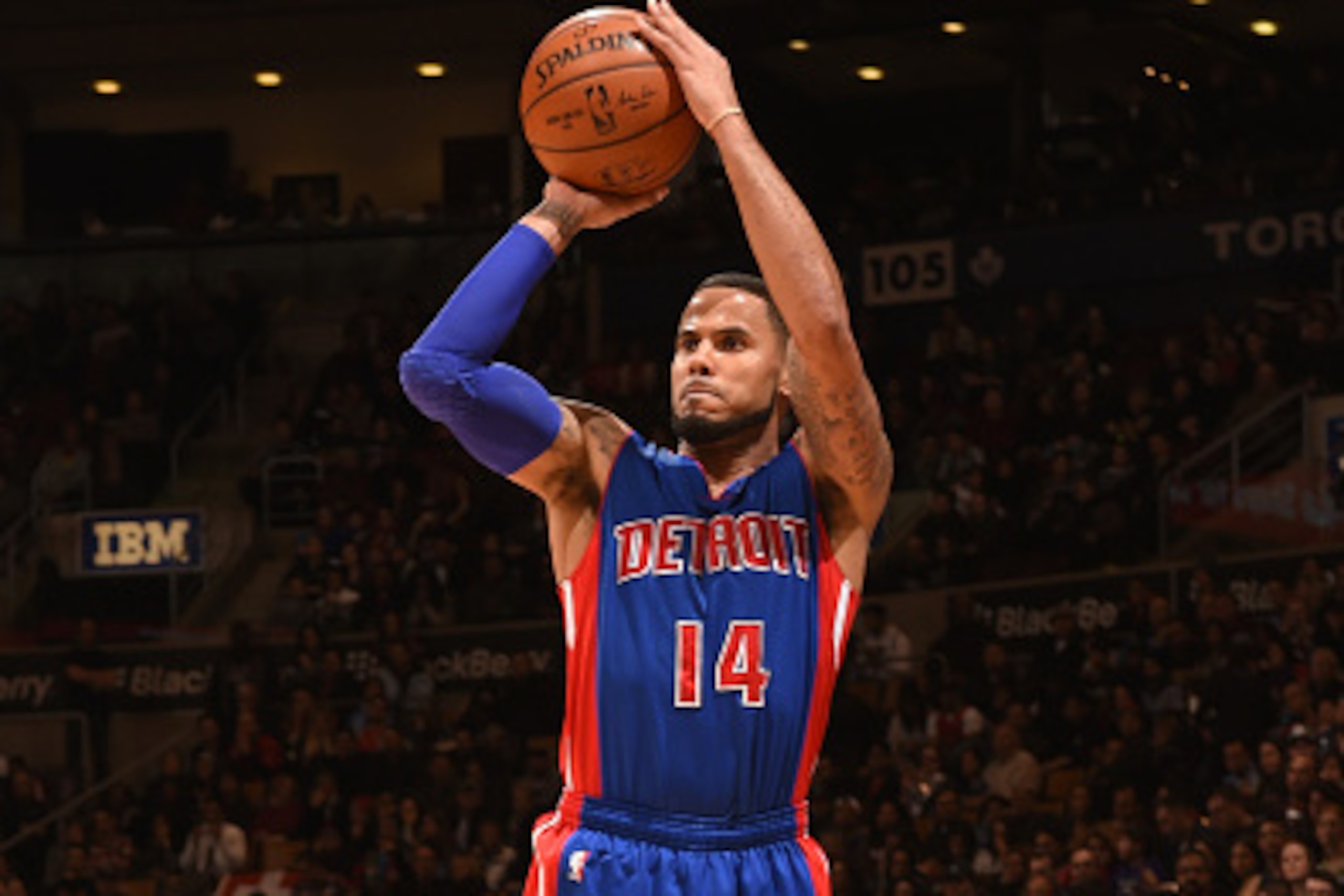 TORONTO, ON - JANUARY 25: D.J. Augustin #14 of the Detroit Pistons takes a shot against the Toronto Raptors on January 25, 2015 at the Air Canada Centre in Toronto, Ontario, Canada. NOTE TO USER: User expressly acknowledges and agrees that, by downloading