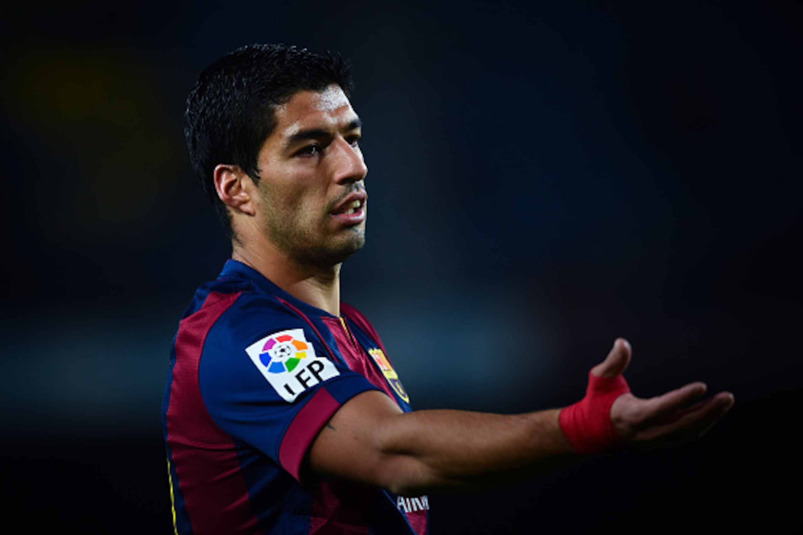 BARCELONA, SPAIN - JANUARY 08:  Luis Suarez of FC Barcelona reacts during the Copa del Rey  Round of 16 First Leg match between FC Barcelona and Elche CF at Camp Nou on January 8, 2015 in Barcelona, Spain.  (Photo by David Ramos/Getty Images)