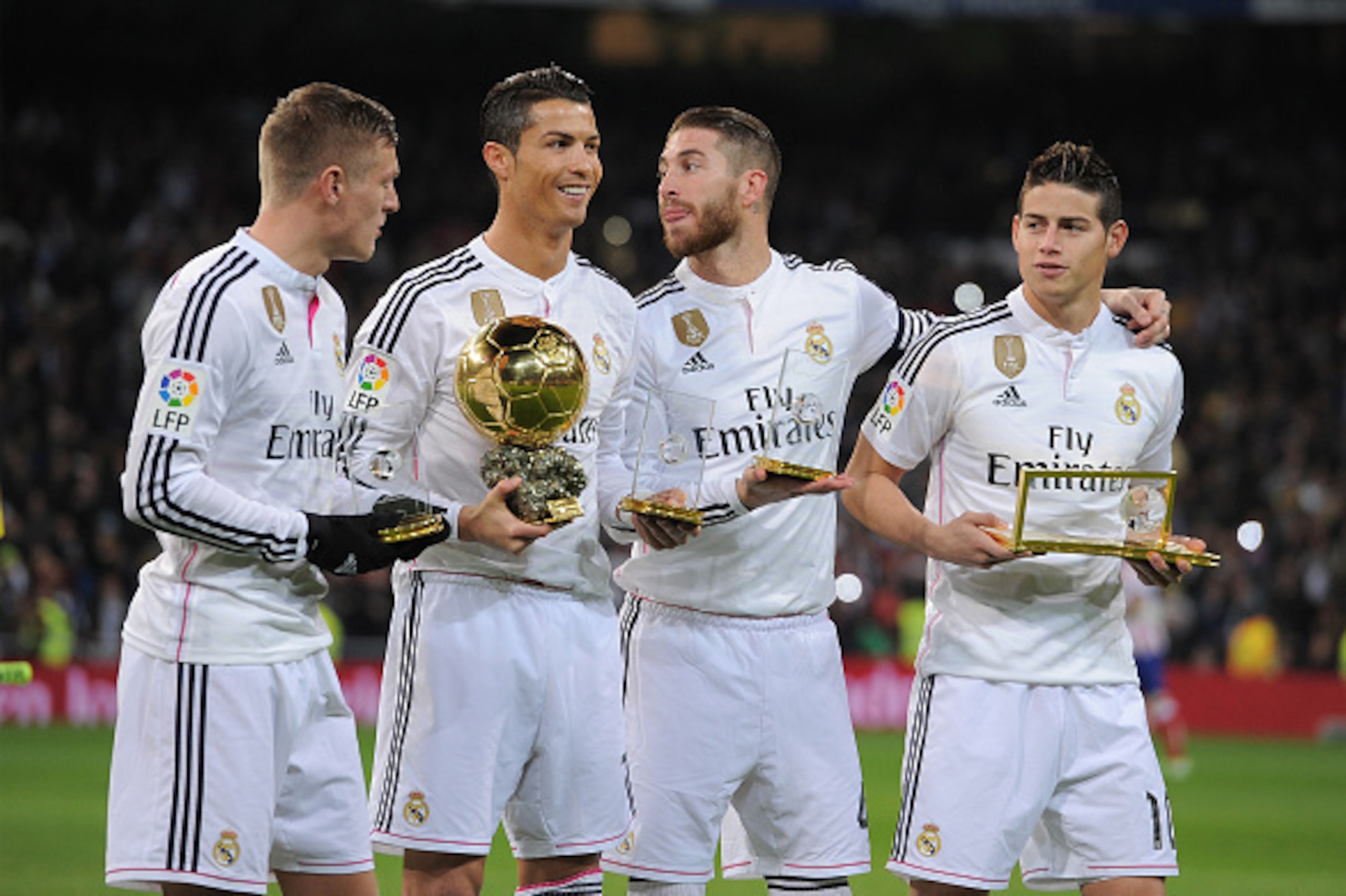 MADRID, SPAIN - JANUARY 15:  FIFA award winners Toni Kroos, Cristiano Ronaldo, Sergio Ramos and James Rodriguez with trophies ahead of the Copa del Rey Round of 16, Second leg match between Real Madrid and Atletico de Madrid at Estadio Santiago Bernabeu o