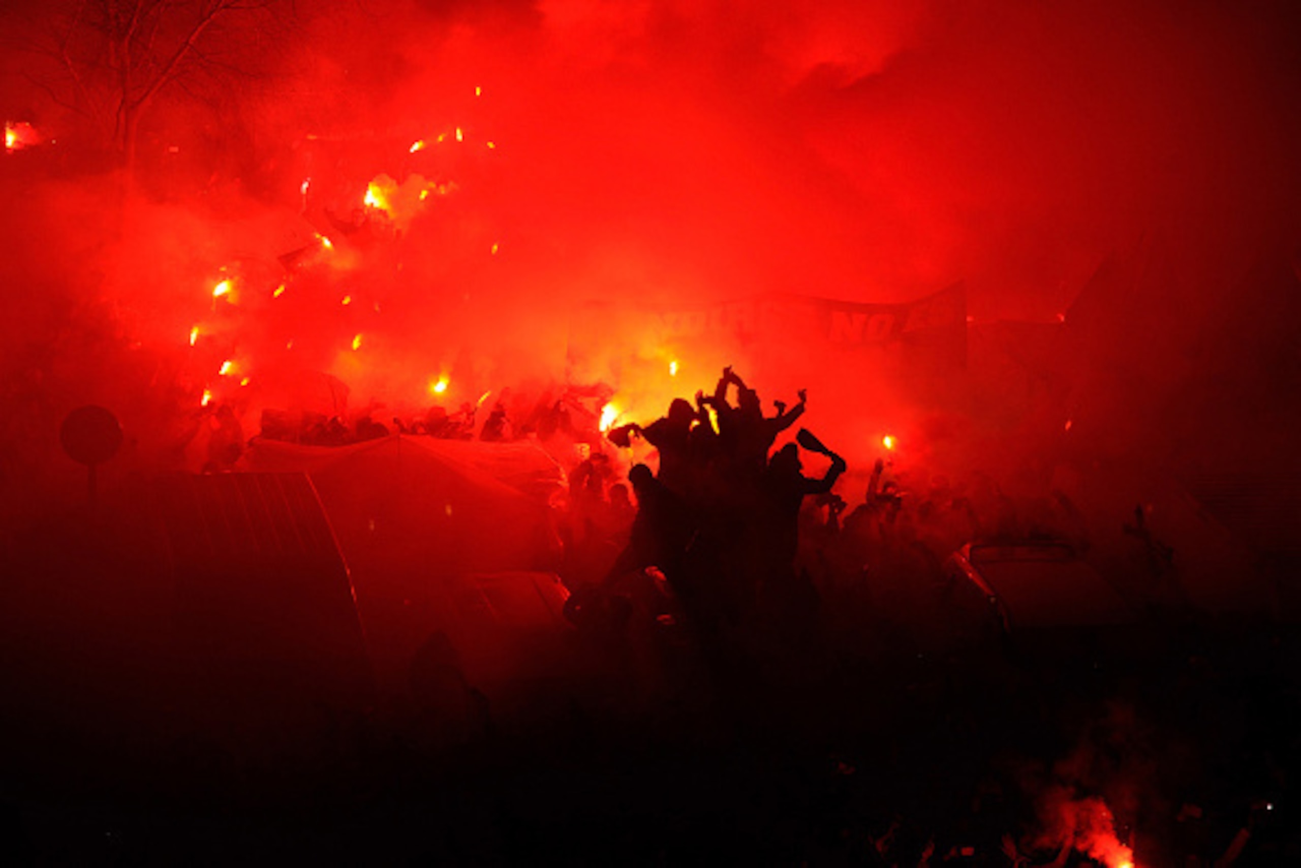 MADRID, SPAIN - JANUARY 15:  Real Madrid fans cheer the arrival of the players bus prior to the Copa del Rey Round of 16, Second leg match at Estadio Santiago Bernabeu on January 15, 2015 in Madrid, Spain.  (Photo by Denis Doyle/Getty Images)