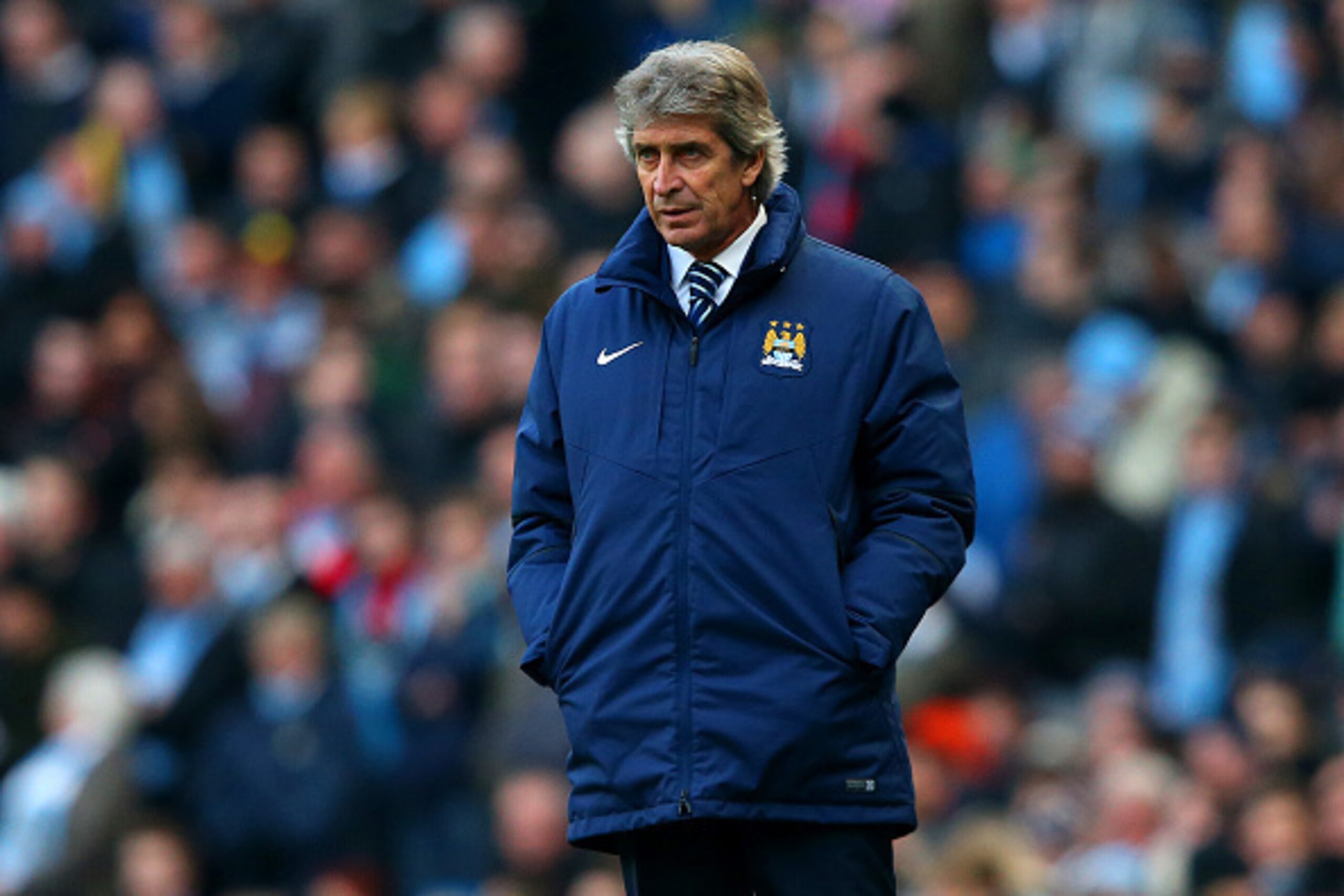 MANCHESTER, ENGLAND - JANUARY 24: Manuel Pellegrini, manager of Manchester City looks on during the FA Cup Fourth Round match between Manchester City and Middlesbrough at Etihad Stadium on January 24, 2015 in Manchester, England. (Photo by Alex Livesey/ MANCHESTER, ENGLAND - JANUARY 24: Manuel Pellegrini, manager of Manchester City looks on during the FA Cup Fourth Round match between Manchester City and Middlesbrough at Etihad Stadium on January 24, 2015 in Manchester, England. (Photo by Alex Livesey/