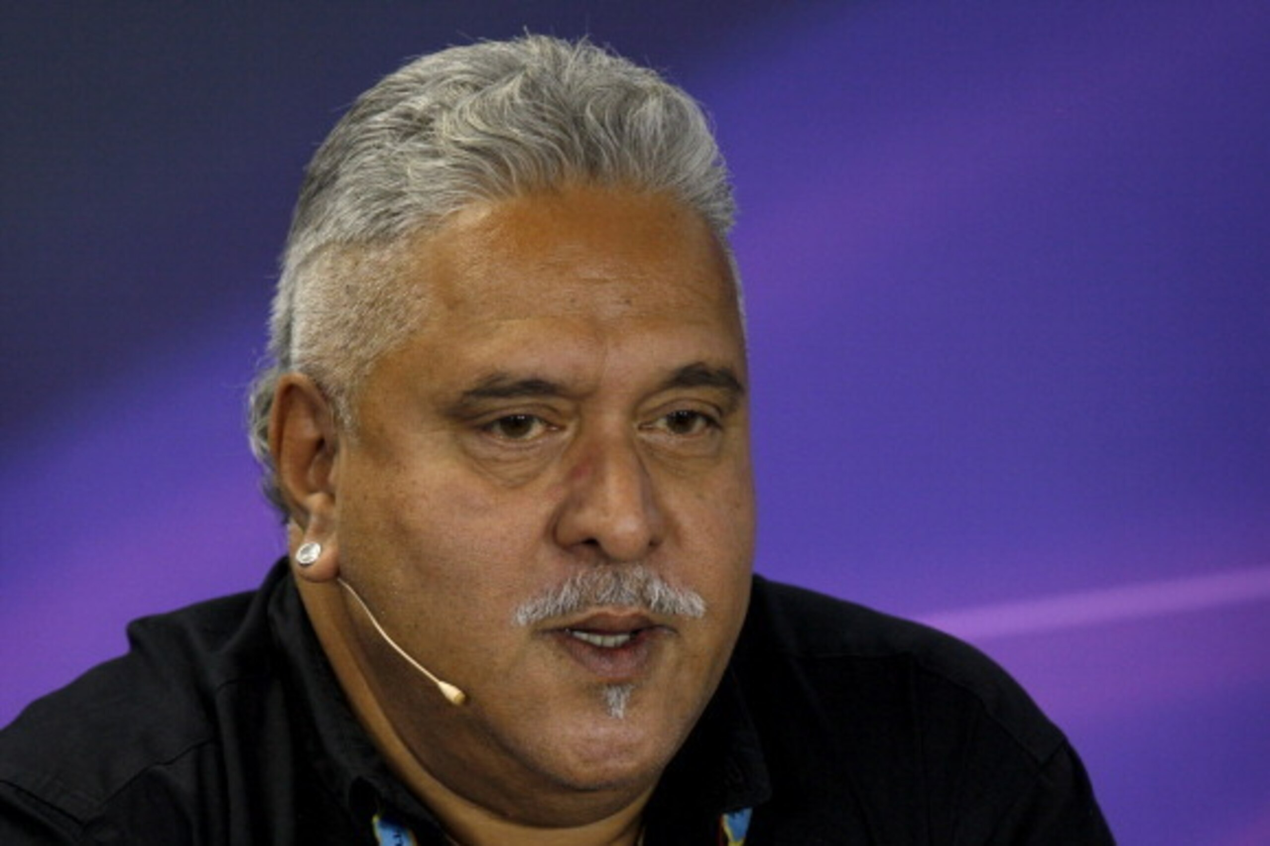 BUDAPEST, HUNGARY - JULY 25:  Force India team principal Vijay Mallya speaks during a press conference after practice ahead of the Hungarian Formula One Grand Prix at Hungaroring on July 25, 2014 in Budapest, Hungary.  (Photo by Drew Gibson/Getty Images)