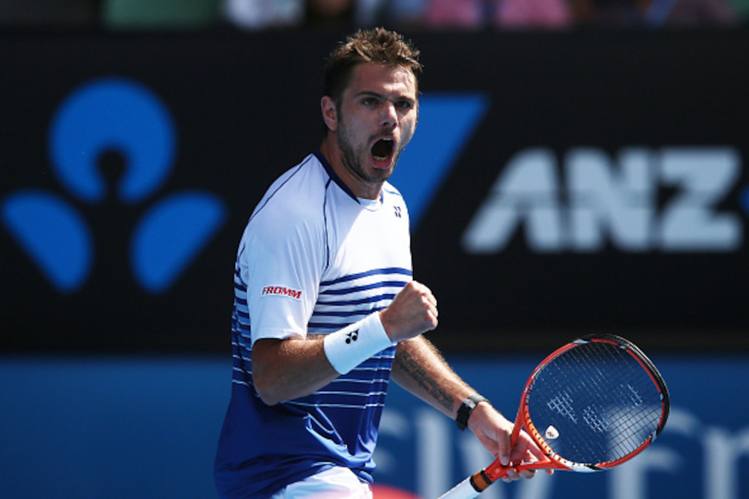 MELBOURNE, AUSTRALIA - JANUARY 28:  Stanislas Wawrinka of Switzerland celebrates a point in his quarterfinal match against Kei Nishikori of Japan during day 10 of the 2015 Australian Open at Melbourne Park on January 28, 2015 in Melbourne, Australia.  (Ph