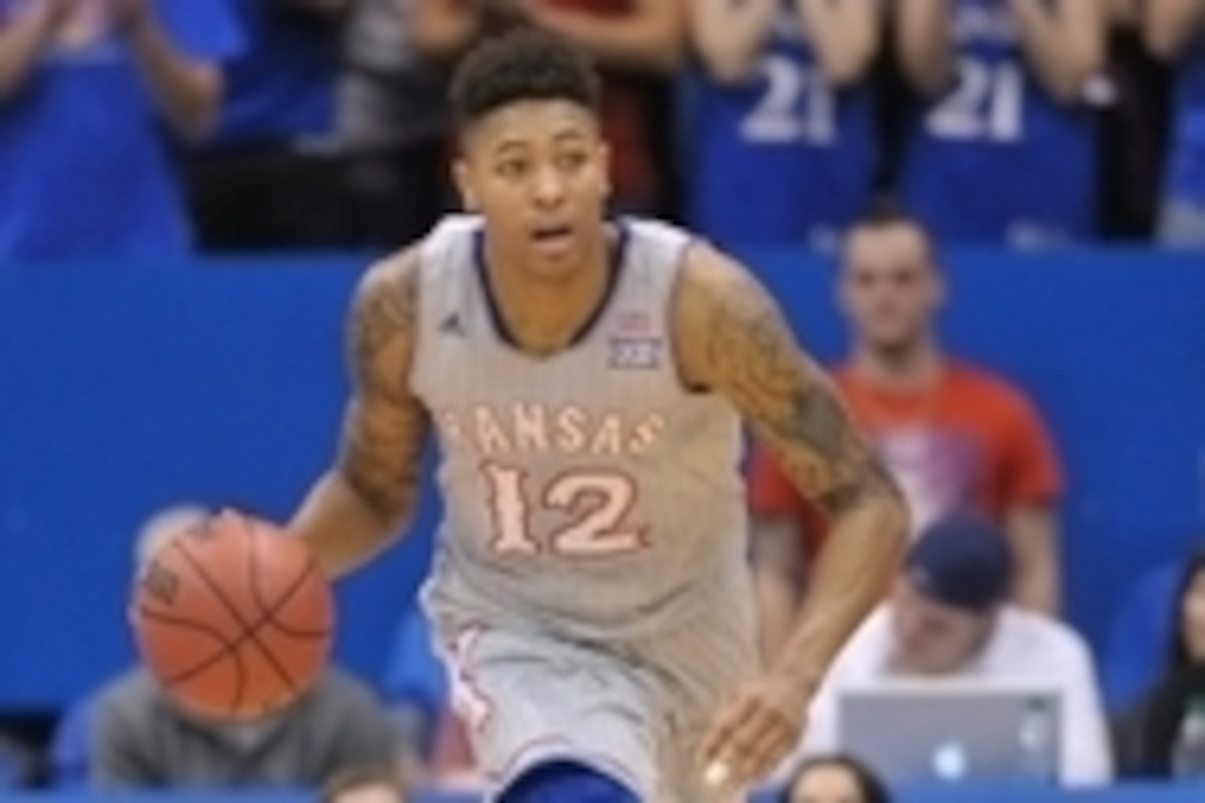 Dec 30, 2014; Lawrence, KS, USA; Kansas Jayhawks guard Kelly Oubre Jr. (12) dribbles the ball during the second half against the Kent State Golden Flashes at Allen Fieldhouse. Kansas won 78-62. Mandatory Credit: Denny Medley-USA TODAY Sports Dec 30, 2014; Lawrence, KS, USA; Kansas Jayhawks guard Kelly Oubre Jr. (12) dribbles the ball during the second half against the Kent State Golden Flashes at Allen Fieldhouse. Kansas won 78-62. Mandatory Credit: Denny Medley-USA TODAY Sports