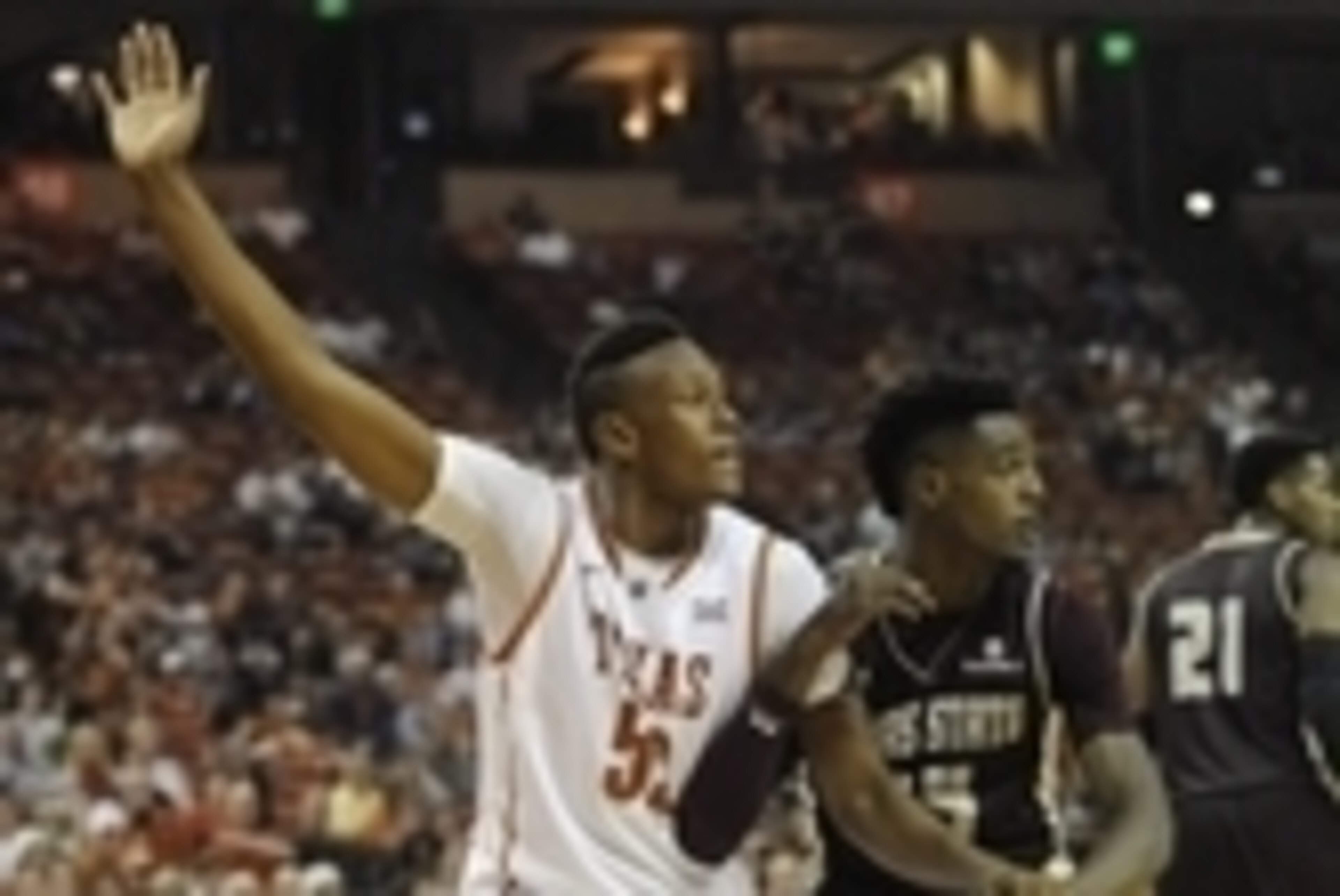 Dec 13, 2014; Austin, TX, USA; Texas Longhorns forward Myles Turner (52) fights for position against Texas State Bobcats forward Cameron Naylor (24) during the second half at the Frank Erwin Special Events Center. Texas beat Texas State 59-27. Mandatory C Dec 13, 2014; Austin, TX, USA; Texas Longhorns forward Myles Turner (52) fights for position against Texas State Bobcats forward Cameron Naylor (24) during the second half at the Frank Erwin Special Events Center. Texas beat Texas State 59-27. Mandatory C