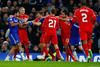 LONDON, ENGLAND - JANUARY 27:  Diego Costa of Chelsea clashes with Martin Skrtel, Steven Gerrard and Emre Can of Liverpool during the Capital One Cup Semi-Final second leg between Chelsea and Liverpool at Stamford Bridge on January 27, 2015 in London, Eng