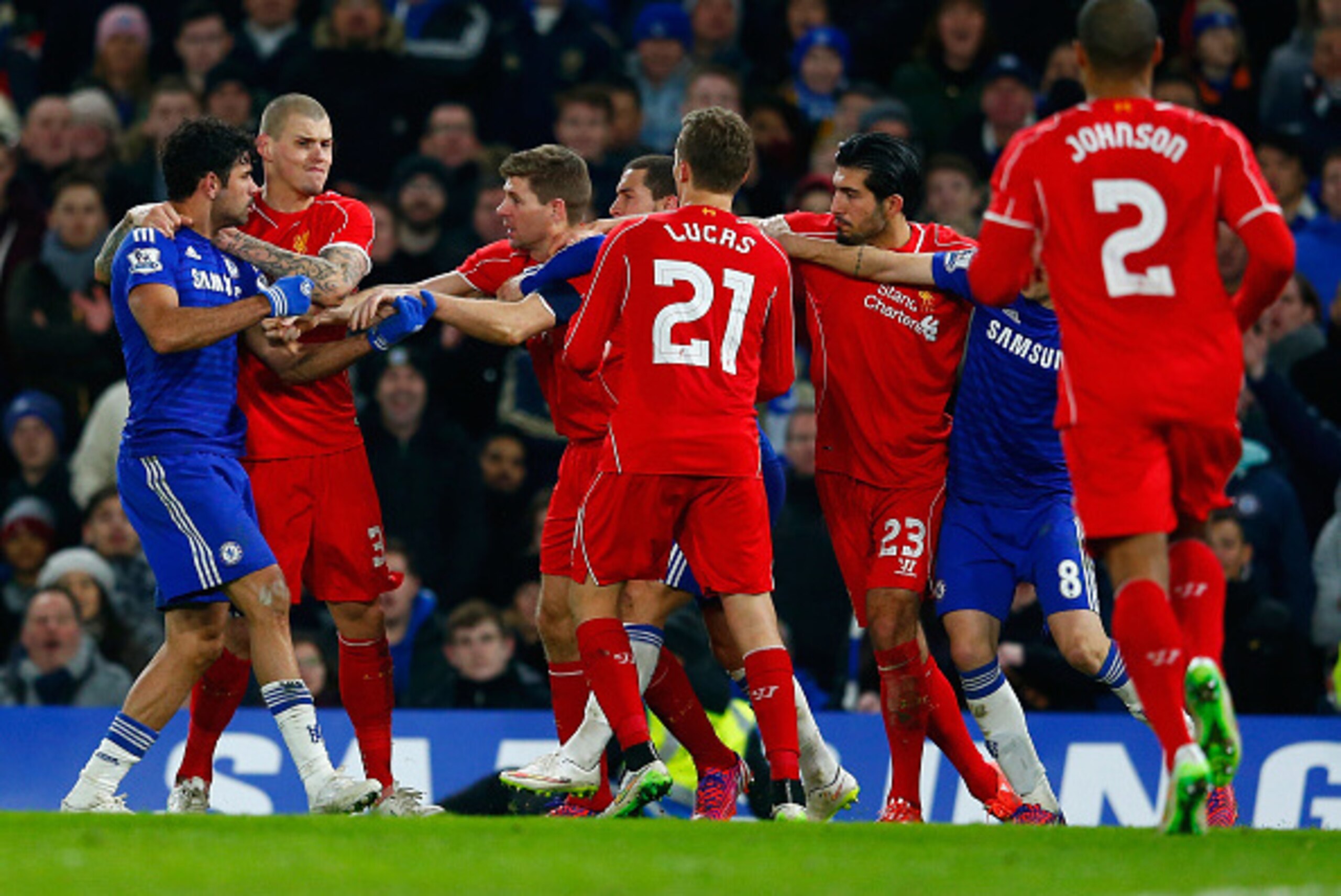 LONDON, ENGLAND - JANUARY 27:  Diego Costa of Chelsea clashes with Martin Skrtel, Steven Gerrard and Emre Can of Liverpool during the Capital One Cup Semi-Final second leg between Chelsea and Liverpool at Stamford Bridge on January 27, 2015 in London, Eng