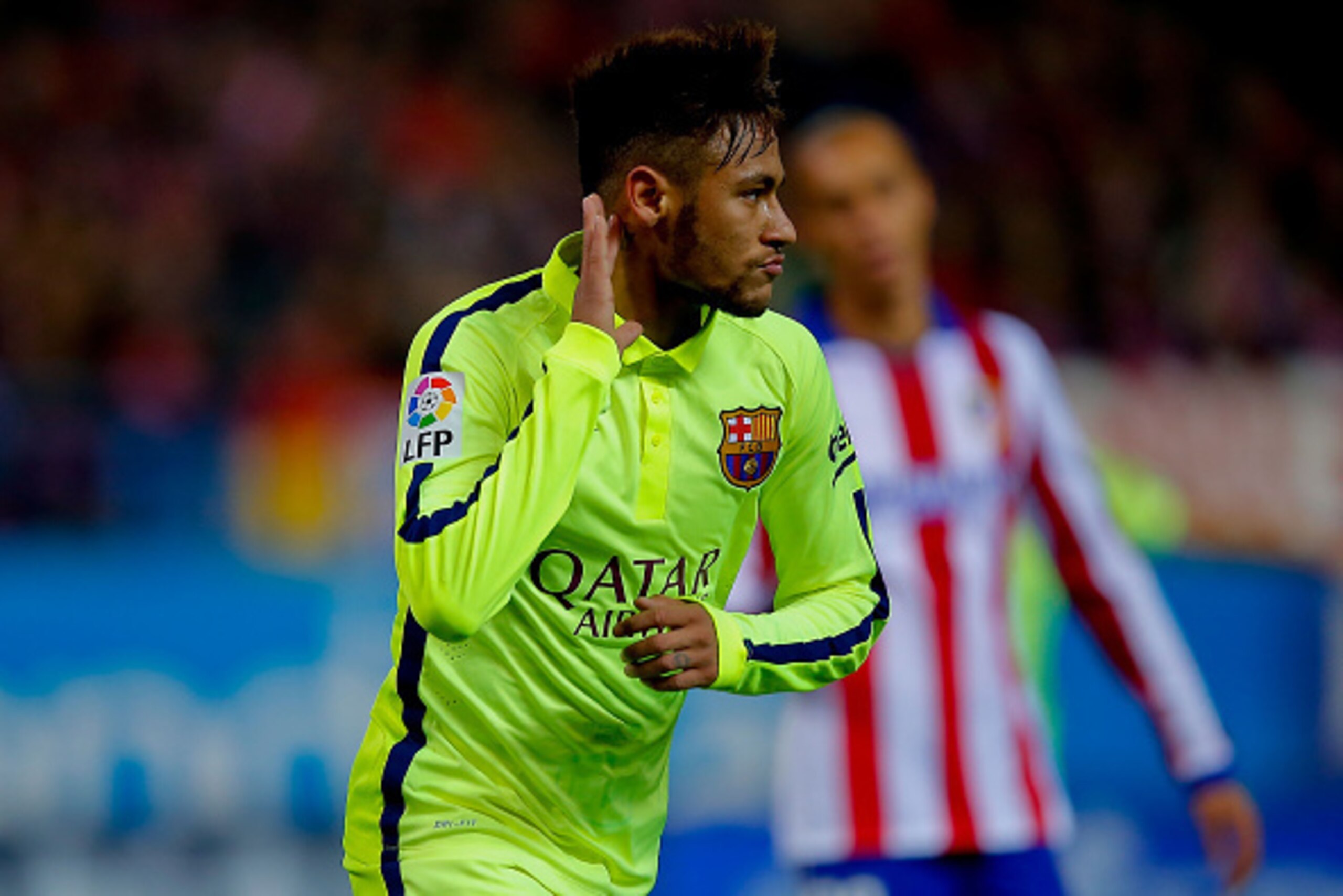 MADRID, SPAIN - JANUARY 28:  Neymar JR. of FC Barcelona celebrates scoring their third goal during the Copa del Rey Round of 8 second leg match between Club Atletico de Madrid and FC Barcelona at Vicente Calderon Stadium on January 28, 2015 in Madrid, Spa