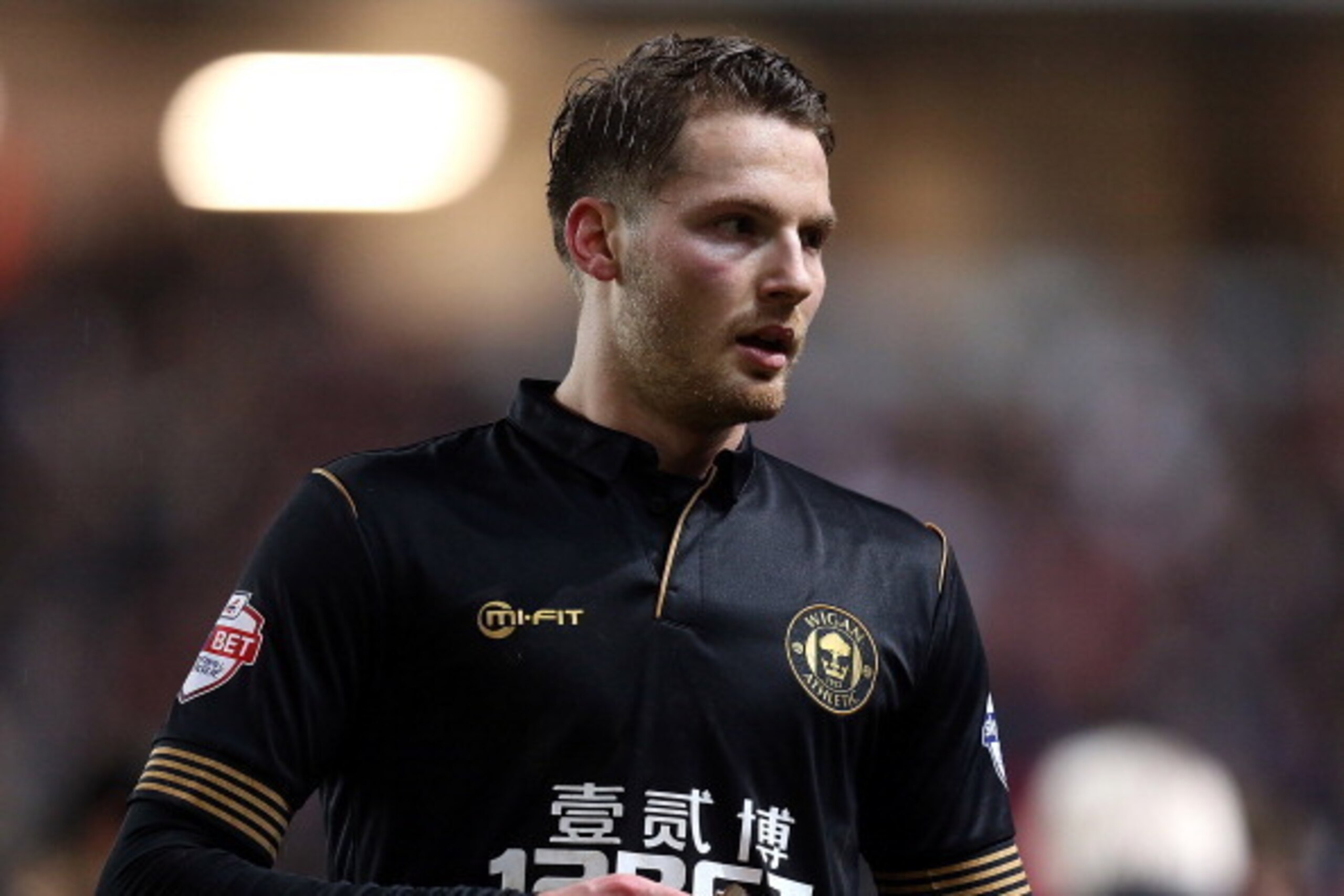 MILTON KEYNES, ENGLAND - JANUARY 14:  Nick Powell of Wigan Athletic in action during the FA Cup with Budweiser Third Round Replay between Milton Keynes Dons and Wigan Athletic at Stadium mk on January 14, 2014 in Milton Keynes, England.  (Photo by Pete No