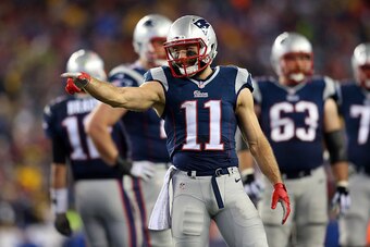 FOXBORO, MA - JANUARY 18:  Julian Edelman #11 of the New England Patriots reacts after a play in the first quarter against the Indianapolis Colts of the 2015 AFC Championship Game at Gillette Stadium on January 18, 2015 in Foxboro, Massachusetts.  (Photo 