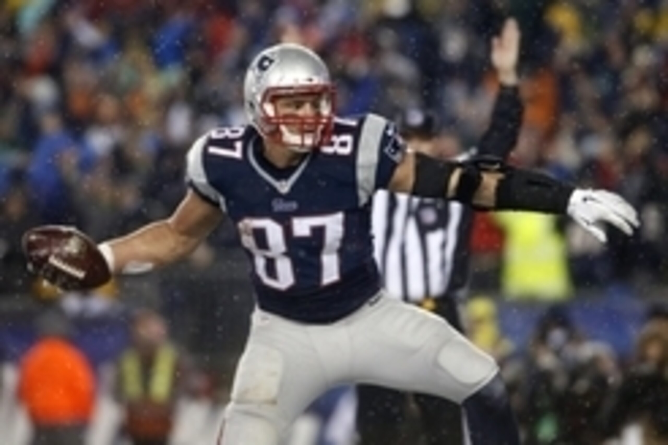Jan 18, 2015; Foxborough, MA, USA; New England Patriots tight end Rob Gronkowski (87) celebrates after scoring a touchdown against the Indianapolis Colts in the third quarter in the AFC Championship Game at Gillette Stadium. Mandatory Credit: David Butler