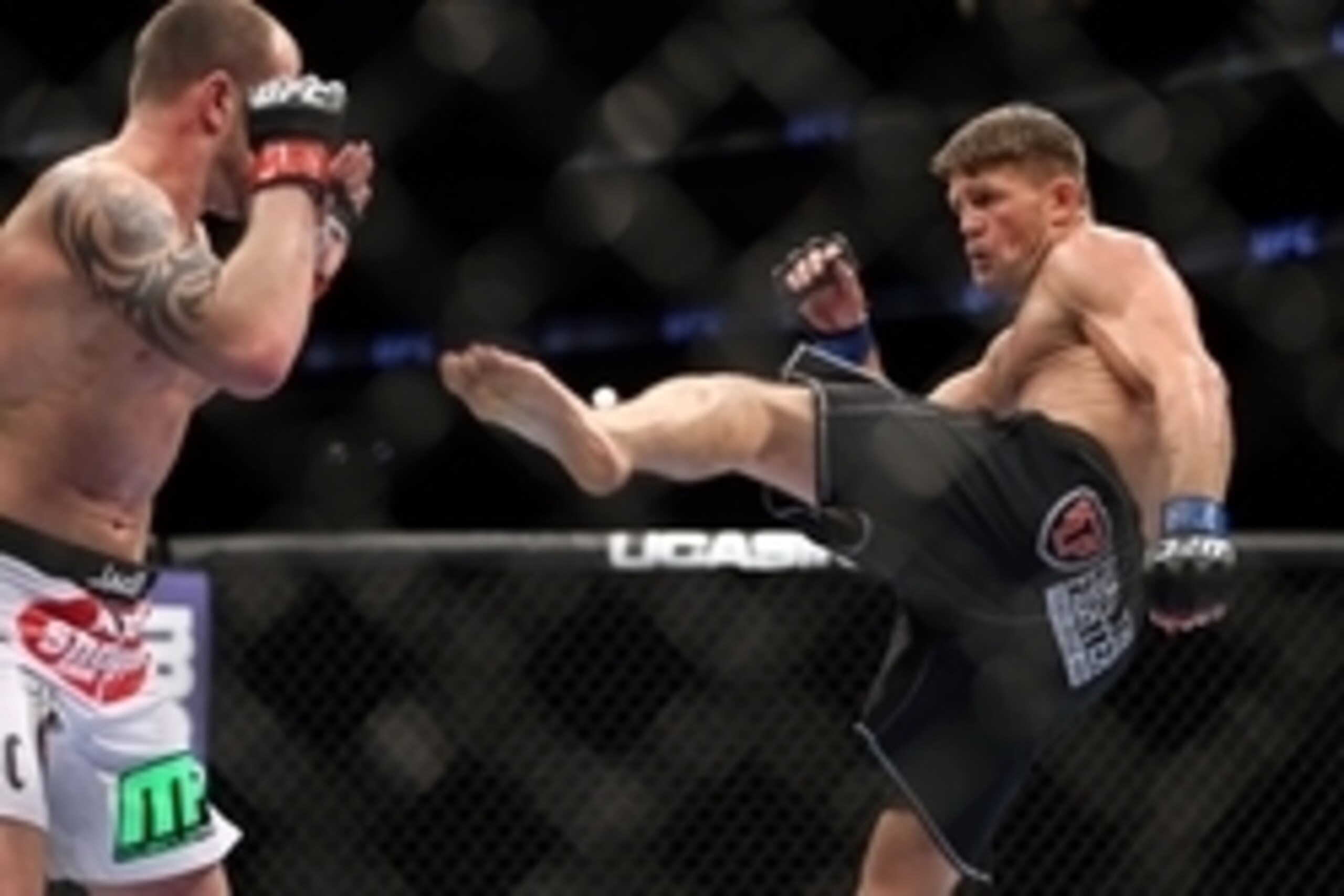 Feb 1, 2014; Newark, NJ, USA; Nick Catone (red gloves) fights Tom Watson (blue gloves) during UFC 169 at Prudential Center. Mandatory Credit: Joe Camporeale-USA TODAY Sports