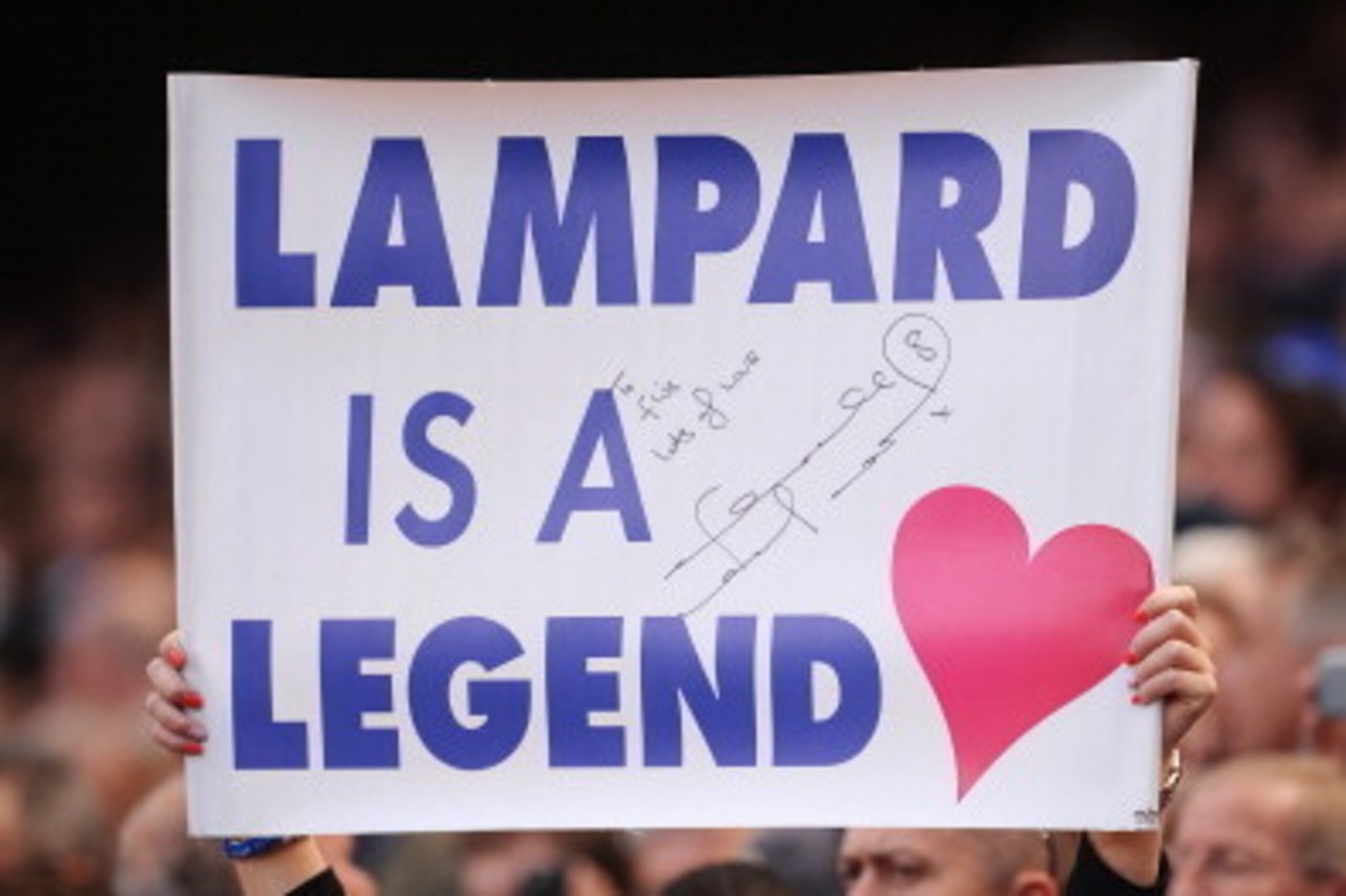 LONDON, ENGLAND - MAY 04:  Chelsea fan shows her support for Frank Lampard during the Barclays Premier League match between Chelsea and Norwich City at Stamford Bridge on May 4, 2014 in London, England.  (Photo by Michael Regan/Getty Images)