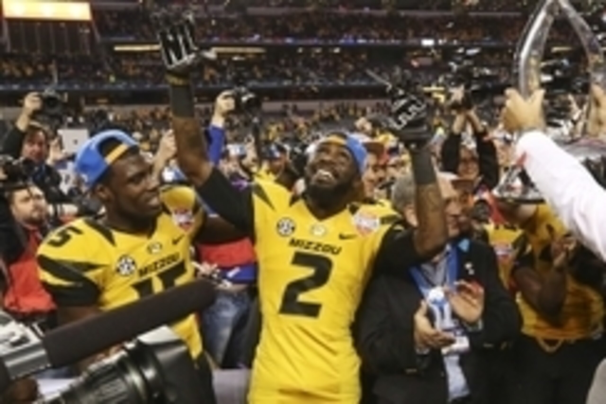 Jan 3, 2014; Arlington, TX, USA; Missouri Tigers wide receiver Dorial Green-Beckham (left) and wide receiver L'Damian Washington (2) celebrate the victory against the Oklahoma State Cowboys in the 2014 Cotton Bowl at AT&T Stadium. Missouri won 41-31. Mand