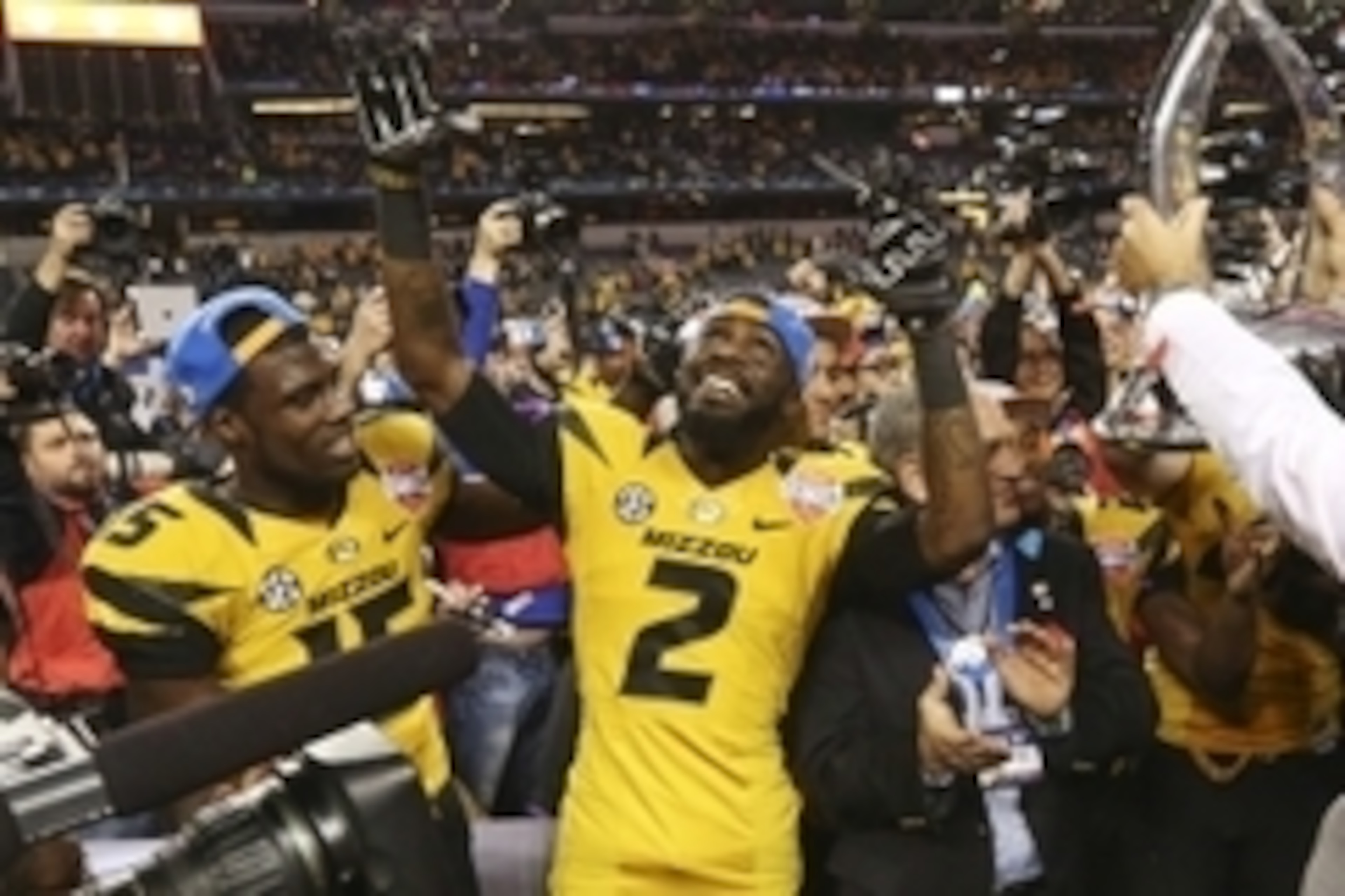 Jan 3, 2014; Arlington, TX, USA; Missouri Tigers wide receiver Dorial Green-Beckham (left) and wide receiver L'Damian Washington (2) celebrate the victory against the Oklahoma State Cowboys in the 2014 Cotton Bowl at AT&T Stadium. Missouri won 41-31. Mand Jan 3, 2014; Arlington, TX, USA; Missouri Tigers wide receiver Dorial Green-Beckham (left) and wide receiver L'Damian Washington (2) celebrate the victory against the Oklahoma State Cowboys in the 2014 Cotton Bowl at AT&T Stadium. Missouri won 41-31. Mand