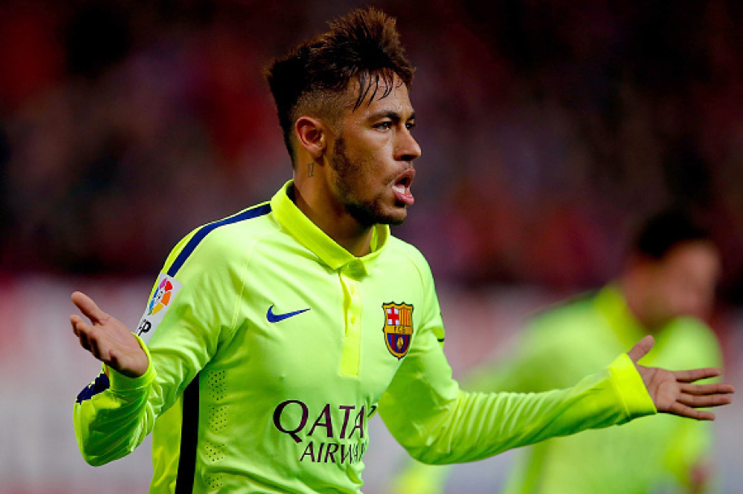 MADRID, SPAIN - JANUARY 28:  Neymar JR. of FC Barcelona celebrates scoring their third goal during the Copa del Rey Round of 8 second leg match between Club Atletico de Madrid and FC Barcelona at Vicente Calderon Stadium on January 28, 2015 in Madrid, Spa