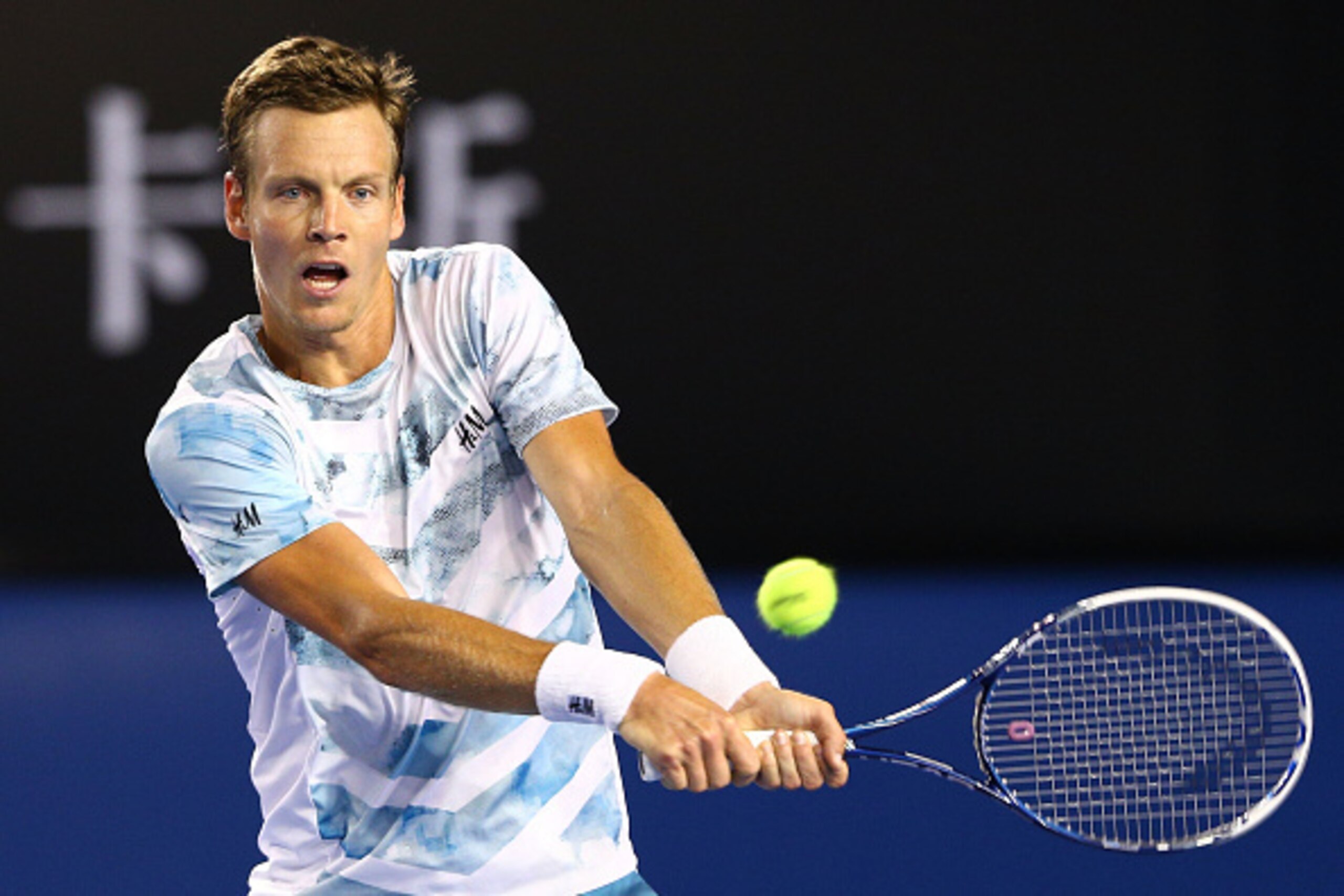 MELBOURNE, AUSTRALIA - JANUARY 29:  Tomas Berdych of the Czech Republic plays a backhand in his semifinal match against Andy Murray of Great Britain during day 11 of the 2015 Australian Open at Melbourne Park on January 29, 2015 in Melbourne, Australia.  