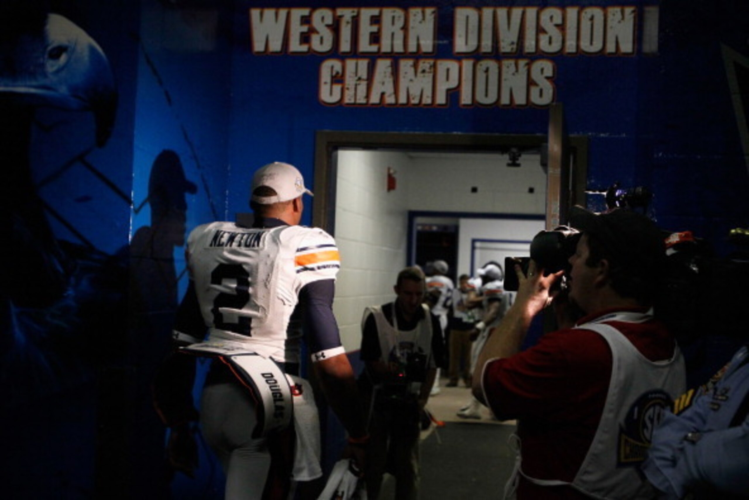 ATLANTA, GA - DECEMBER 04:  Quarterback Cam Newton #2 of the Auburn Tigers enters the locker room after their 56-17 win over the South Carolina Gamecocks during the 2010 SEC Championship at Georgia Dome on December 4, 2010 in Atlanta, Georgia.  (Photo by 