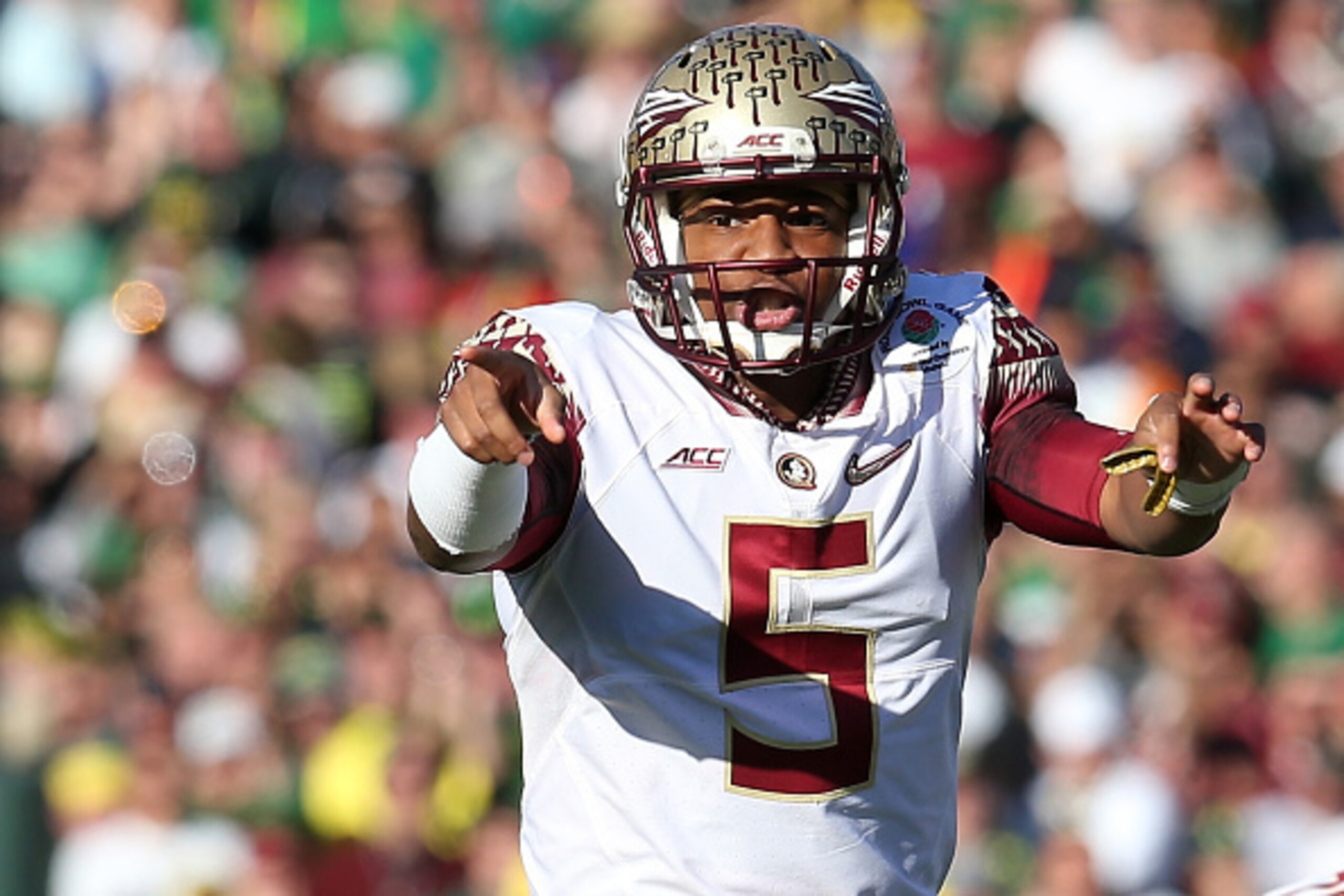 PASADENA, CA - JANUARY 01:  Quarterback Jameis Winston #5 of the Florida State Seminoles signals to his team against the Oregon Ducks in the first quarter of the College Football Playoff Semifinal at the Rose Bowl Game presented by Northwestern Mutual at 