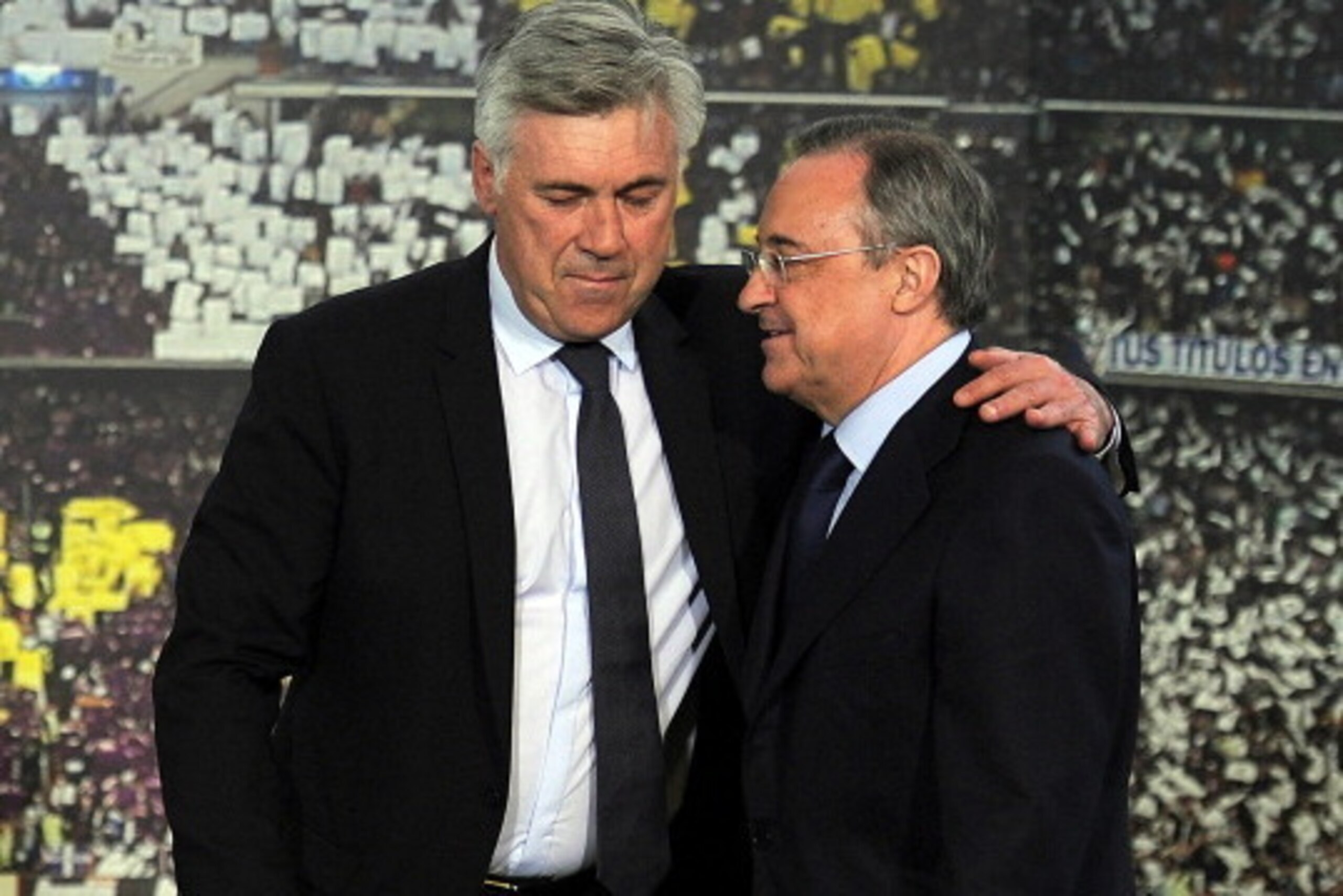MADRID, SPAIN - JUNE 26:  Real Madrid president Florentino Perez (R) presents Carlo Ancelotti as Real's new head coach at Estadio Bernabeu on June 26, 2013 in Madrid, Spain.  (Photo by Denis Doyle/Getty Images)