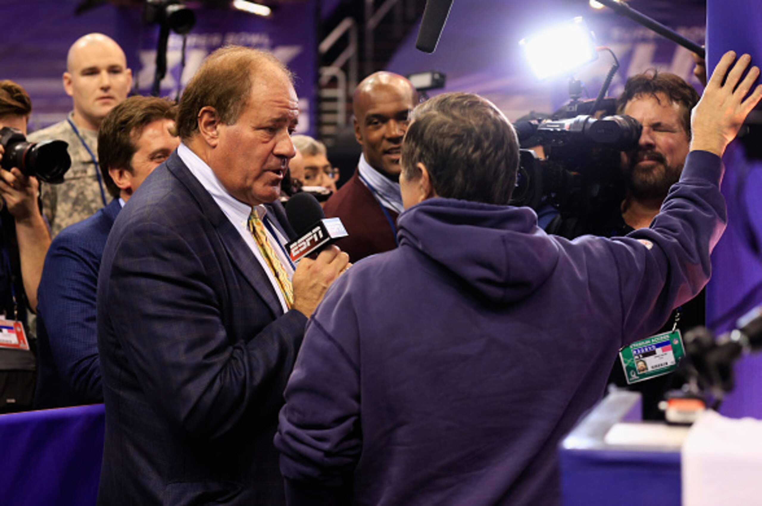 PHOENIX, AZ - JANUARY 27:  ESPN personality Chris Berman interviews head coach Bill Belichick at Super Bowl XLIX Media Day Fueled by Gatorade inside U.S. Airways Center on January 27, 2015 in Phoenix, Arizona.  (Photo by Rob Carr/Getty Images)