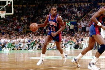 BOSTON - 1986:  Isiah Thomas #11 of the Detroit Pistons drives to the basket against the Boston Celtics during an NBA game in 1986 at the Boston Garden in Boston, Massachusetts.  NOTE TO USER: User expressly acknowledges and agrees that, by downloading an