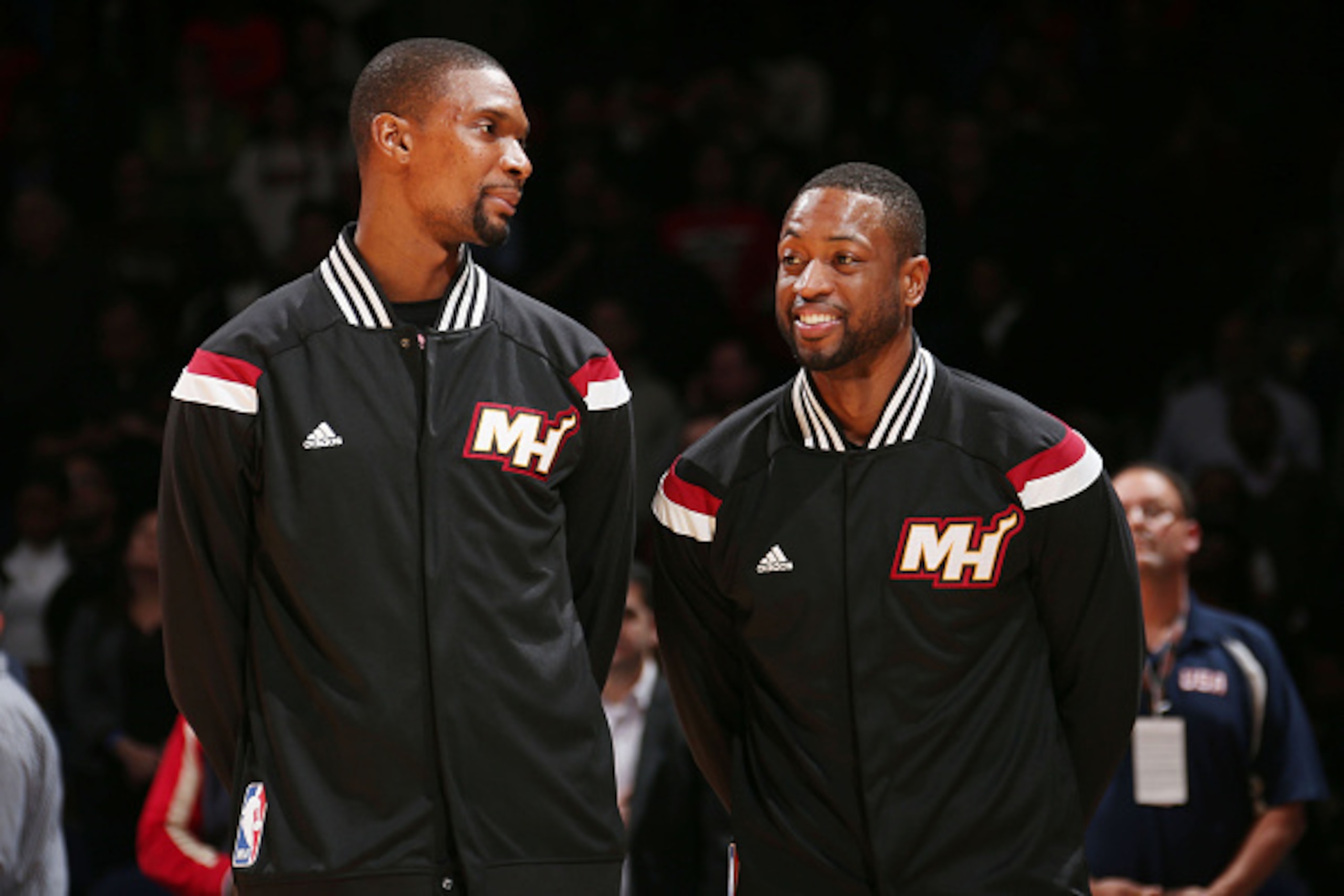 WASHINGTON,DC - December 1: Chris Bosh #1 and Dwyane Wade #3 of the Miami Heat stand on the court before the national anthem before the game against the Washington Wizards on December 1, 2014 at Verizon Center in Washington, DC. NOTE TO USER: User express