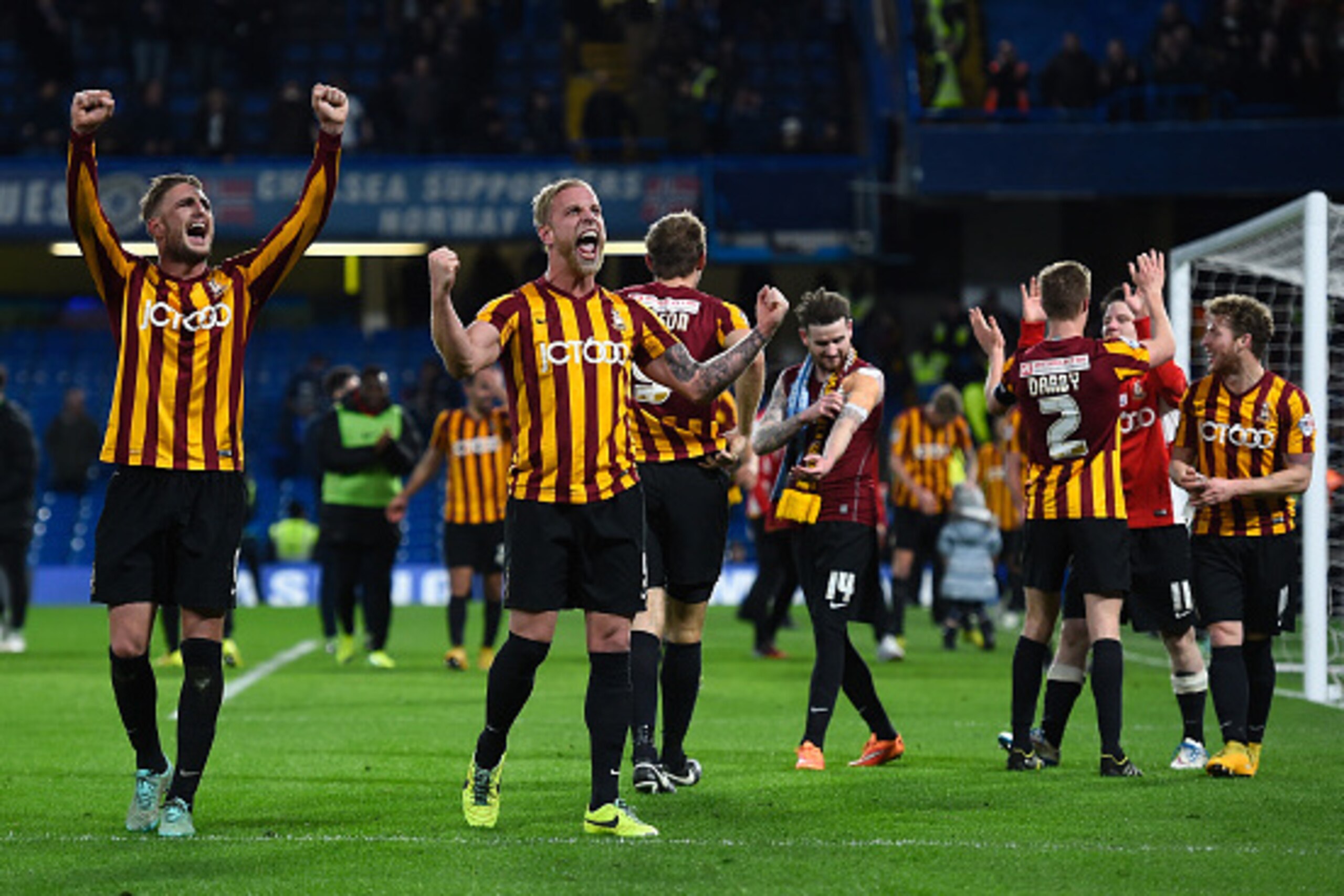 LONDON, ENGLAND - JANUARY 24:  Garry Liddle and Andrew Davies of Bradford celebrate at the end of the FA Cup Fourth Round match between Chelsea and Bradford City at Stamford Bridge on January 24, 2015 in London, England.  (Photo by Mike Hewitt/Getty Image
