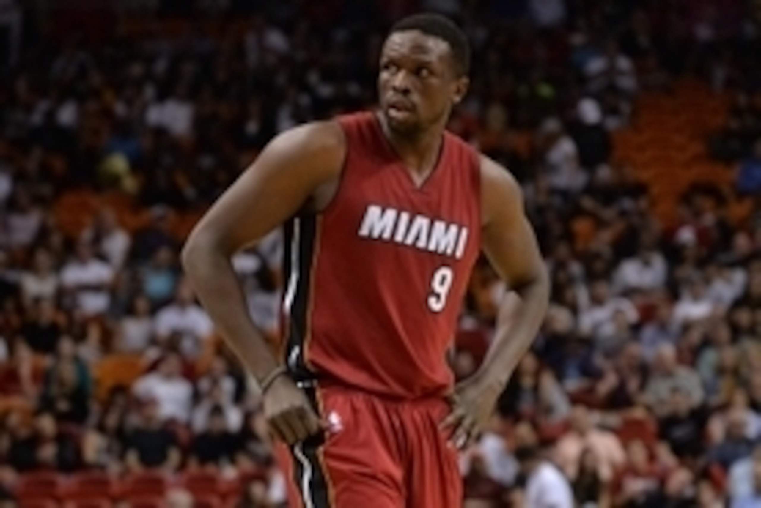 Dec 23, 2014; Miami, FL, USA; Miami Heat forward Luol Deng (9) takes a breather during the second half against Philadelphia 76ers at American Airlines Arena. The 76ers won 91-87. Mandatory Credit: Steve Mitchell-USA TODAY Sports