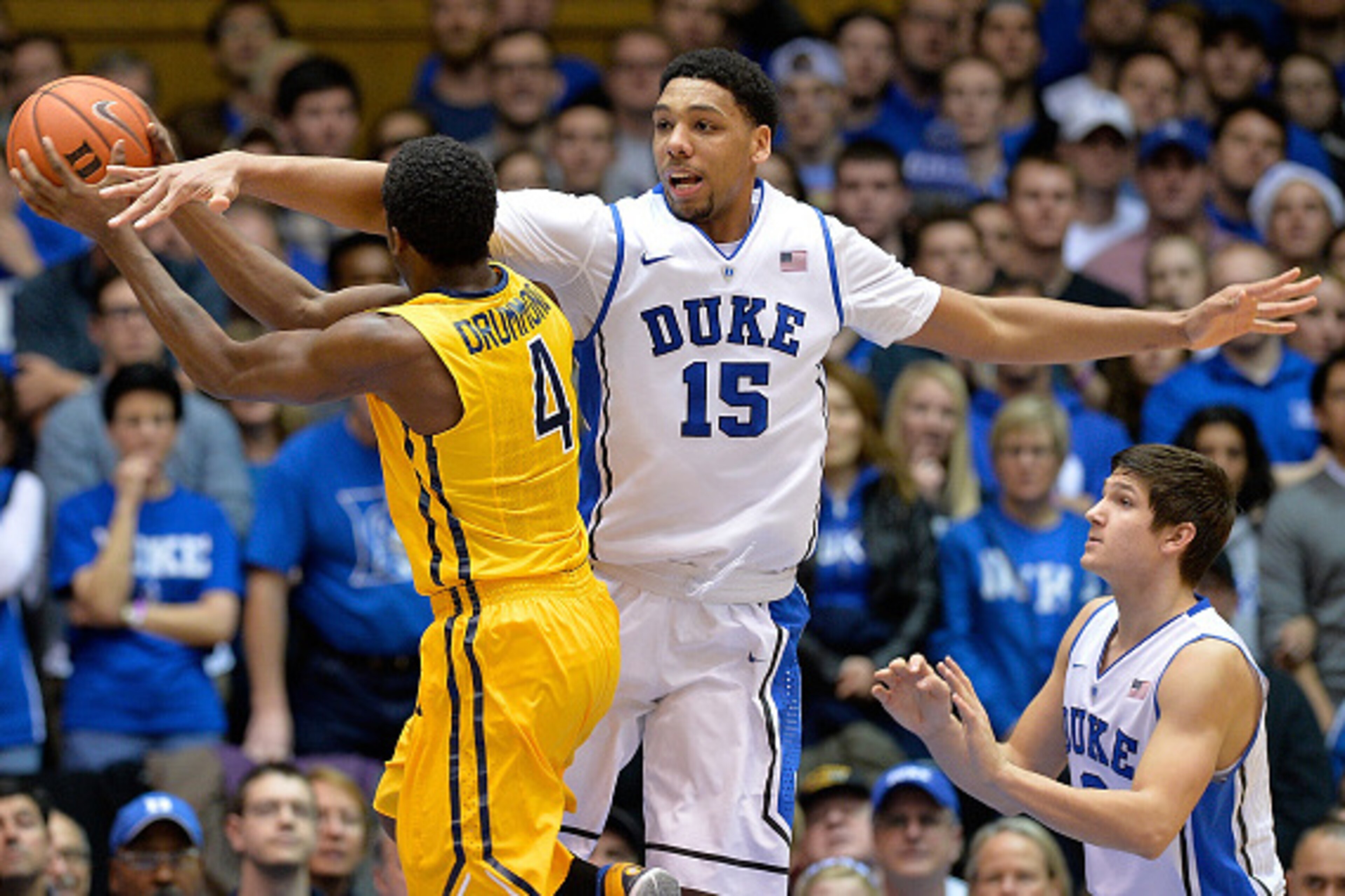 DURHAM, NC - DECEMBER 29: Jahlil Okafor #15 of the Duke Blue Devils defends a drive by Justin Drummond #4 of the Toledo Rockets during their game at Cameron Indoor Stadium on December 29, 2014 in Durham, North Carolina. (Photo by Grant Halverson/Getty I DURHAM, NC - DECEMBER 29: Jahlil Okafor #15 of the Duke Blue Devils defends a drive by Justin Drummond #4 of the Toledo Rockets during their game at Cameron Indoor Stadium on December 29, 2014 in Durham, North Carolina. (Photo by Grant Halverson/Getty I