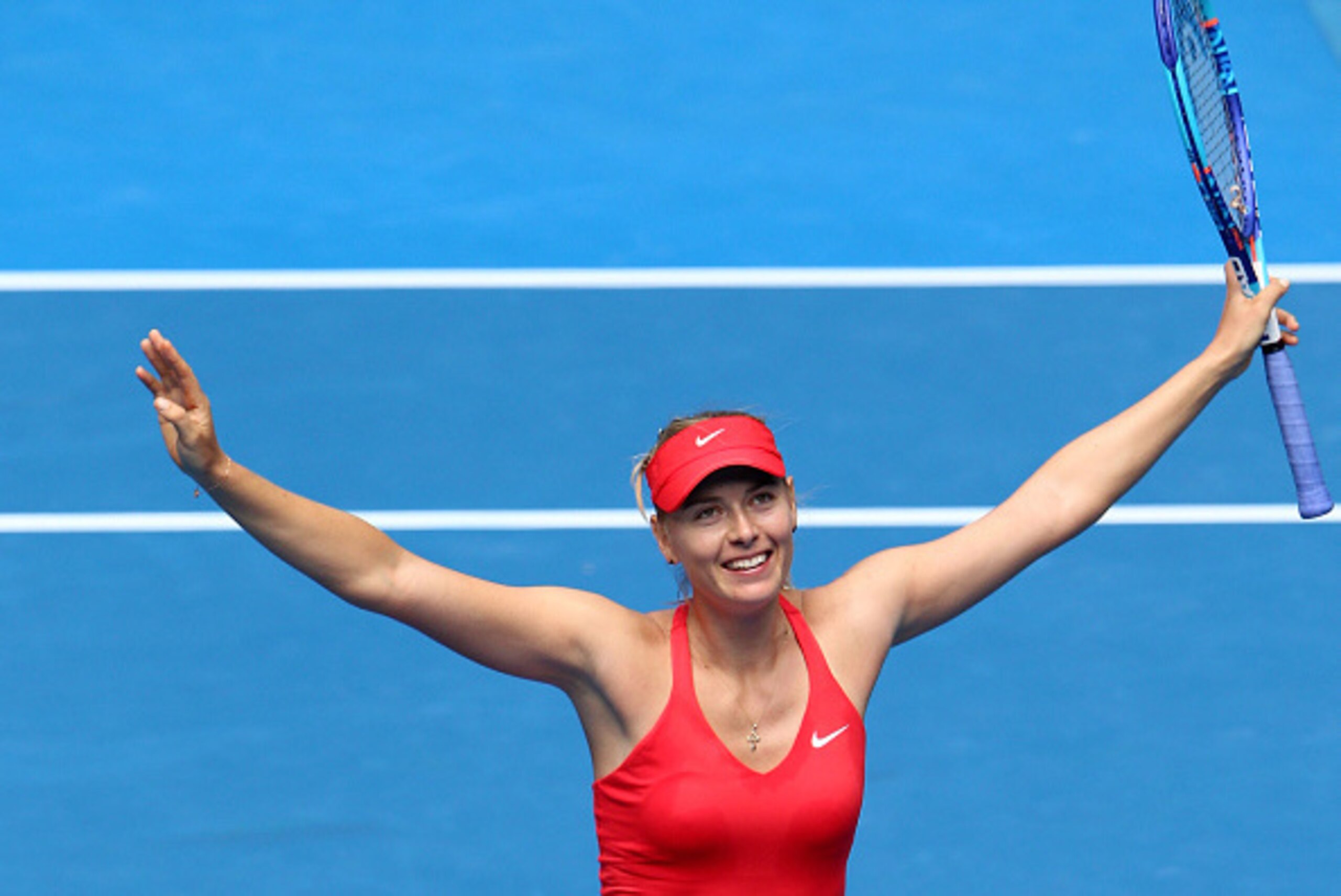 MELBOURNE, AUSTRALIA - JANUARY 29:  Maria Sharapova of Russia celebrates winning her semifinal match against Ekaterina Makarova of Russia during day 11 of the 2015 Australian Open at Melbourne Park on January 29, 2015 in Melbourne, Australia.  (Photo by H