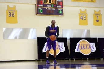 EL SEGUNDO, CA - DECEMBER 3:  Kobe Bryant #24 of the Los Angeles Lakers shoots during practice on December 3, 2013 at Toyota Sports Center in El Segundo, California. NOTE TO USER: User expressly acknowledges and agrees that, by downloading and/or using th