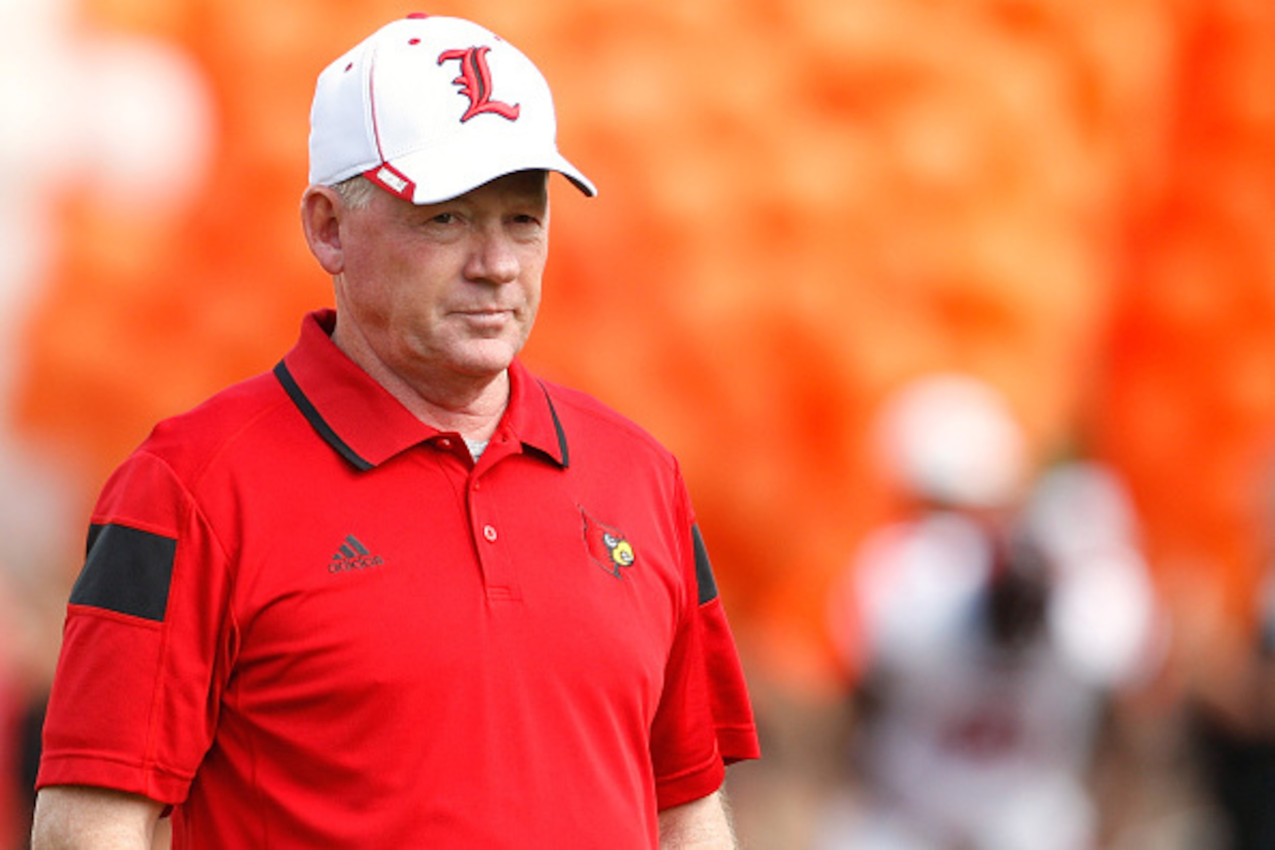 CLEMSON, SC - OCTOBER 11: Head Coach Bobby Petrino of the Louisville Cardinals looks on during warm ups prior to the game against the Clemson Tigers at Memorial Stadium on October 11, 2014 in Clemson, South Carolina. (Photo by Tyler Smith/Getty Images)