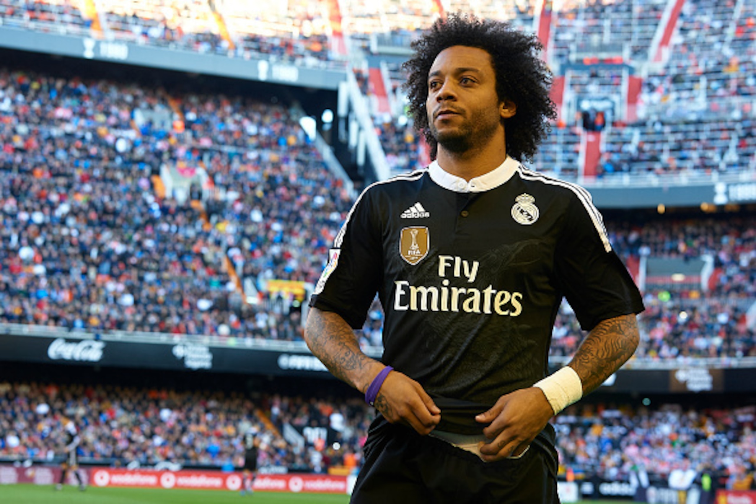 VALENCIA, SPAIN - JANUARY 04:  Marcelo of Real Madrid looks on prior to the start of the La Liga match between Valencia CF and Real Madrid CF at Estadi de Mestalla on January 4, 2015 in Valencia, Spain.  (Photo by Manuel Queimadelos Alonso/Getty Images)