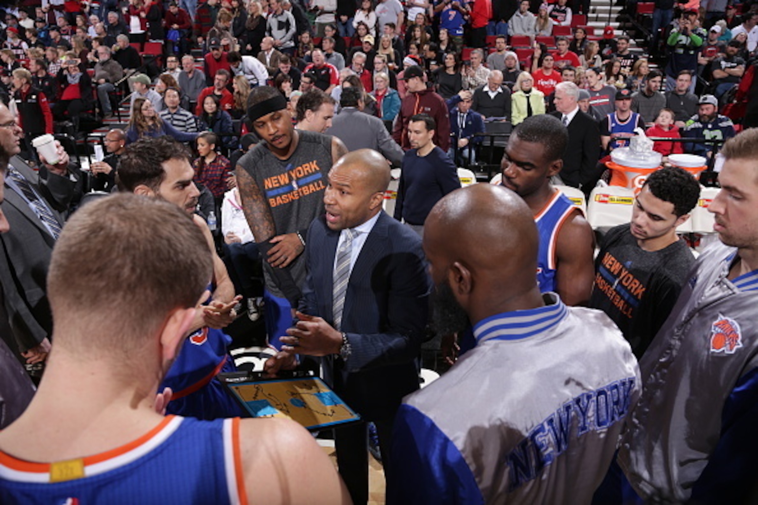 PORTLAND, OR - DECEMBER 28: Derek Fisher of the New York Knicks speaks to the team during a game against the Portland Trail Blazers on December 28, 2014 at the Moda Center Arena in Portland, Oregon. NOTE TO USER: User expressly acknowledges and agrees tha