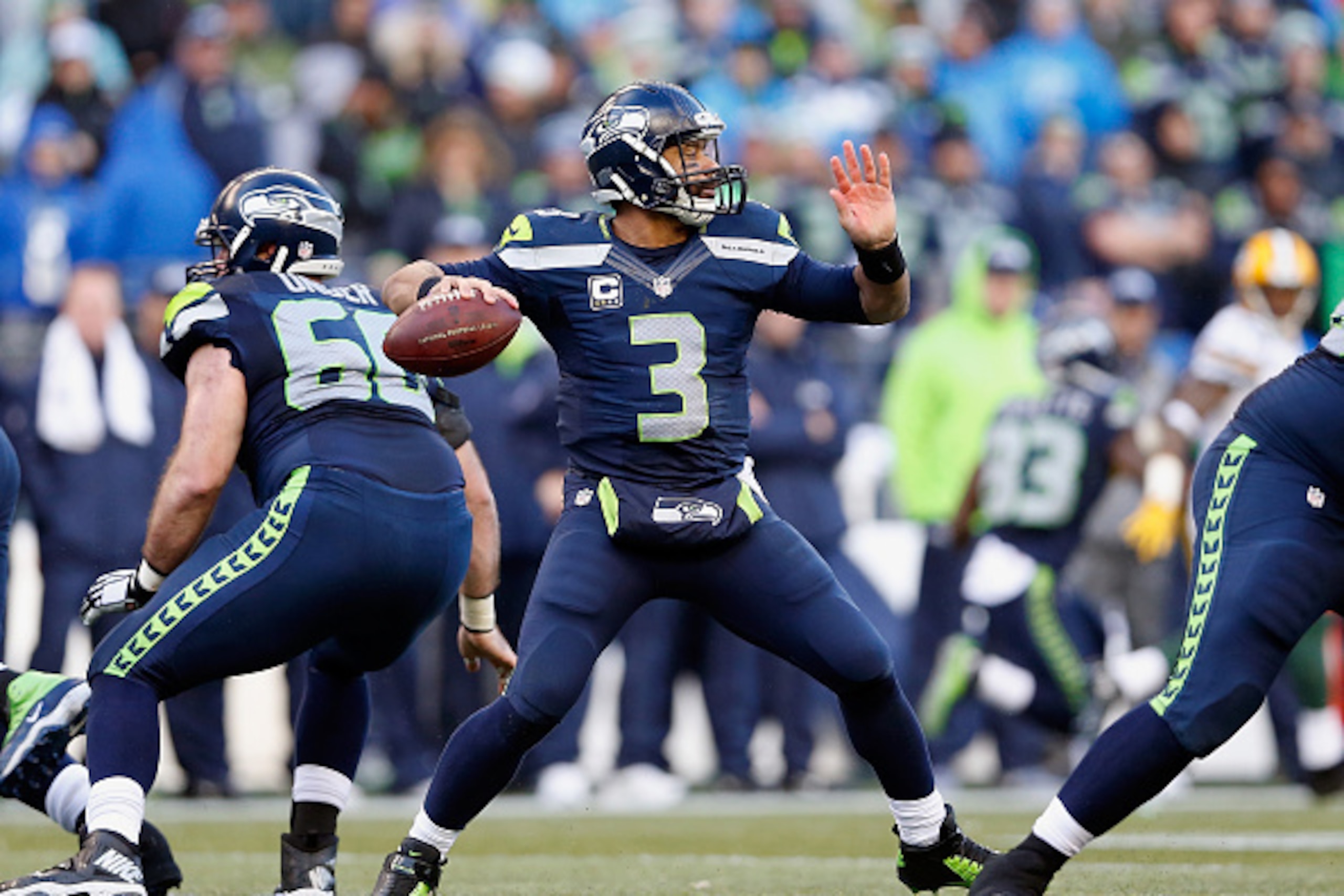 SEATTLE, WA - JANUARY 18:  Quarterback Russell Wilson #3 of the Seattle Seahawks throws a pass during the 2015 NFC Championship game against the Green Bay Packers at CenturyLink Field on January 18, 2015 in Seattle, Washington. The Seahawks defeated the P