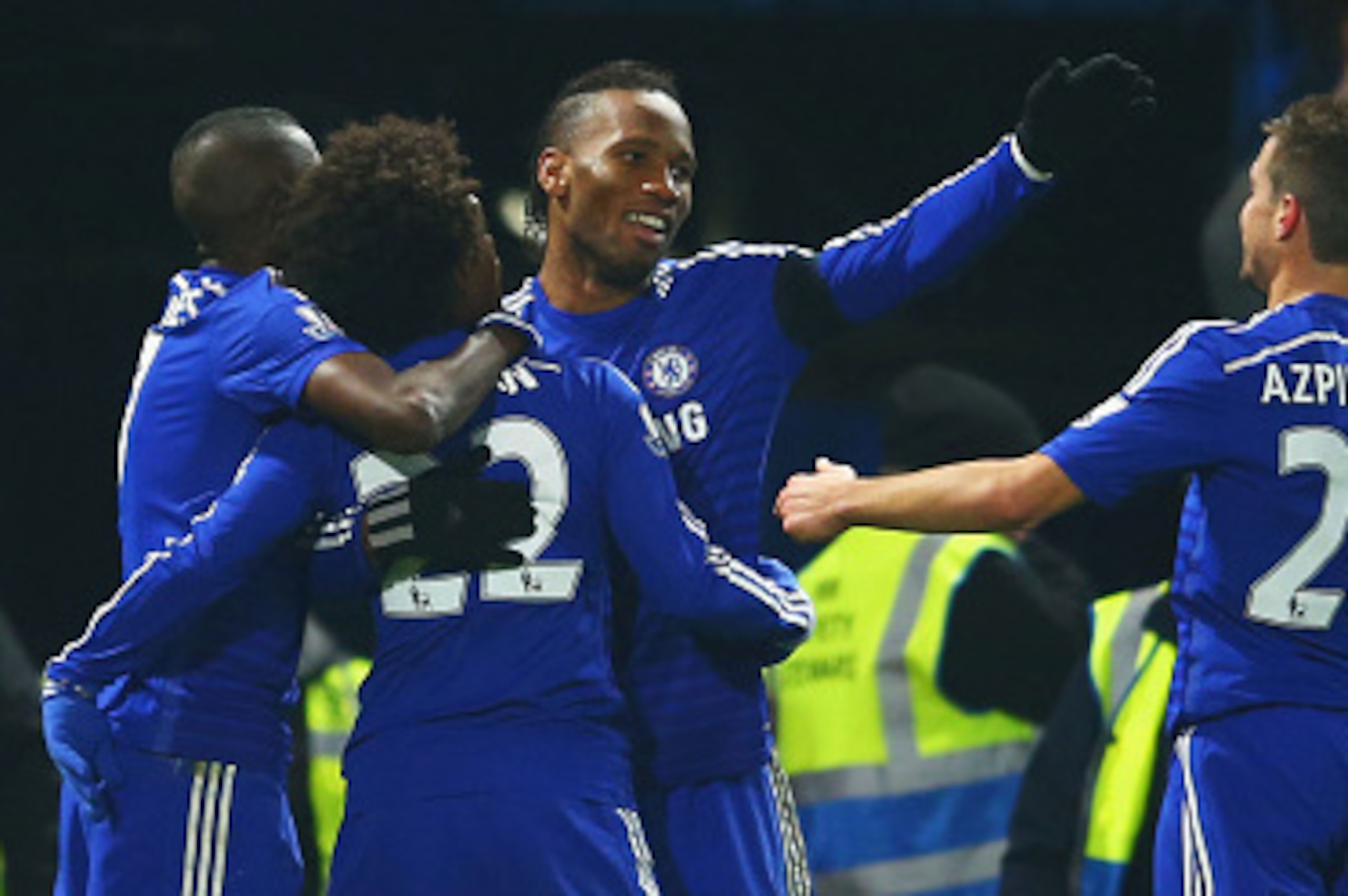 LONDON, ENGLAND - JANUARY 04:  Willian of Chelsea (22) celebrates with Ramires (L), Didier Drogba (2R) and Cesar Azpilicueta (R) as he scores their first goal during the FA Cup Third Round match between Chelsea and Watford at Stamford Bridge on January 4,