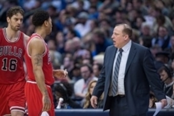 Jan 23, 2015; Dallas, TX, USA; Chicago Bulls head coach Tom Thibodeau gives instructions to Chicago Bulls guard Derrick Rose (1) and forward Pau Gasol (16) during the second half against the Dallas Mavericks at the American Airlines Center. The Bulls defe