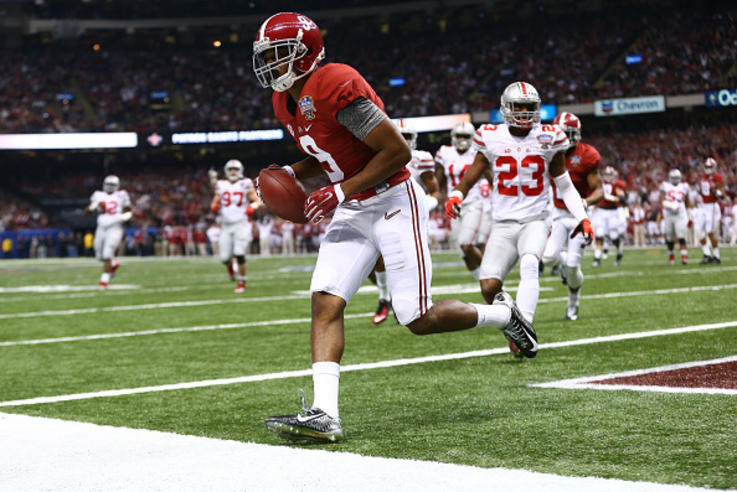 NEW ORLEANS, LA - JANUARY 01:  Amari Cooper #9 of the Alabama Crimson Tide scores a touchdown in the first quarter against the Ohio State Buckeyes during the All State Sugar Bowl at the Mercedes-Benz Superdome on January 1, 2015 in New Orleans, Louisiana.