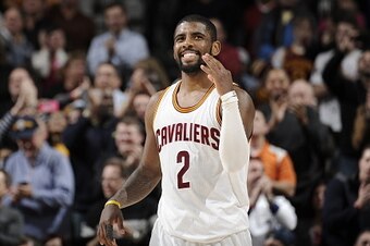 CLEVELAND, OH - JANUARY 28:  Kyrie Irving #2 of the Cleveland Cavaliers celebrates during the game against the Portland Trail Blazers on January 28, 2015 at Quicken Loans Arena in Cleveland, Ohio. NOTE TO USER: User expressly acknowledges and agrees that,