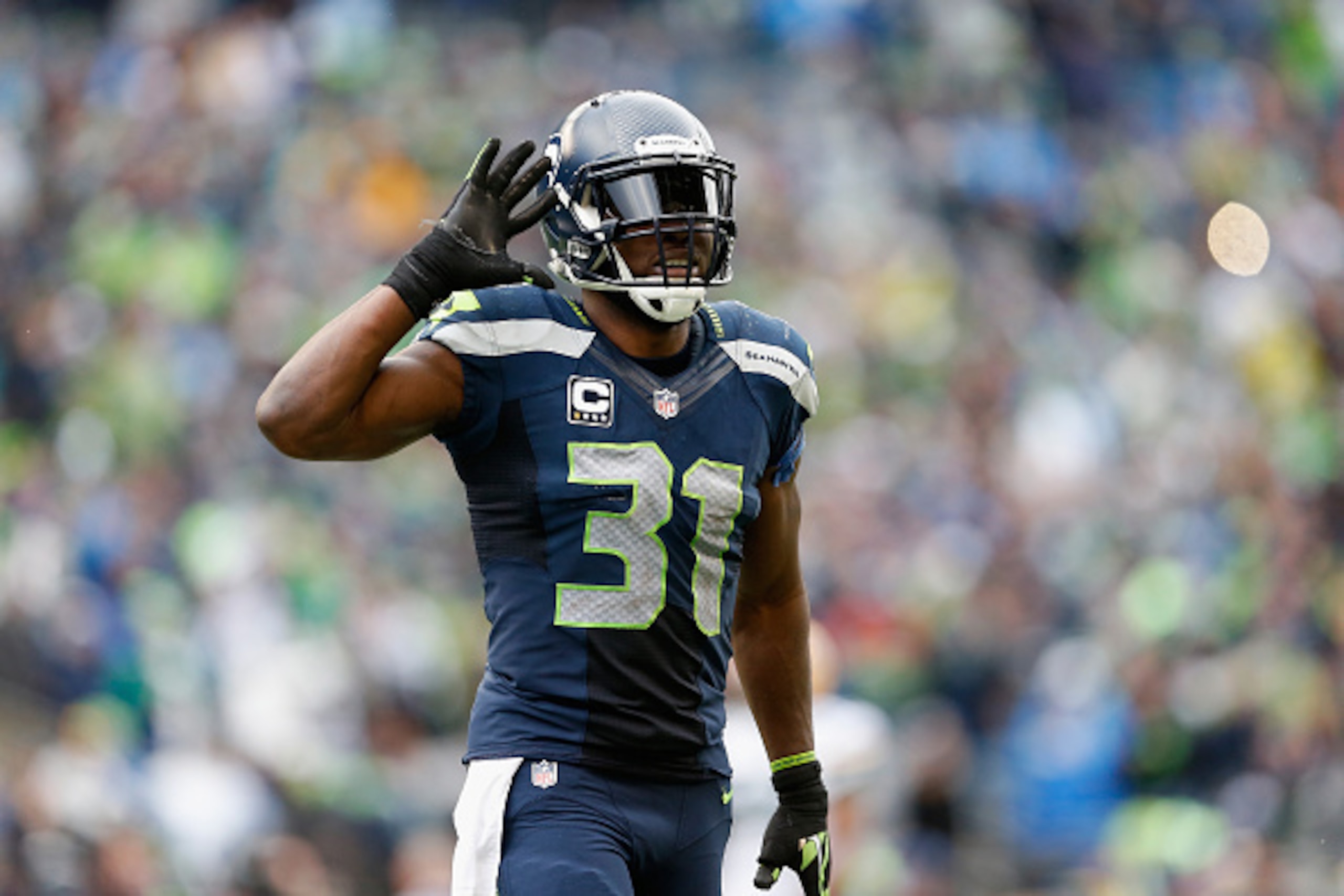 SEATTLE, WA - JANUARY 18:  Strong safety Kam Chancellor #31 of the Seattle Seahawks reacts in the 2015 NFC Championship game against the Green Bay Packers at CenturyLink Field on January 18, 2015 in Seattle, Washington. The Seahawks defeated the Packers 2