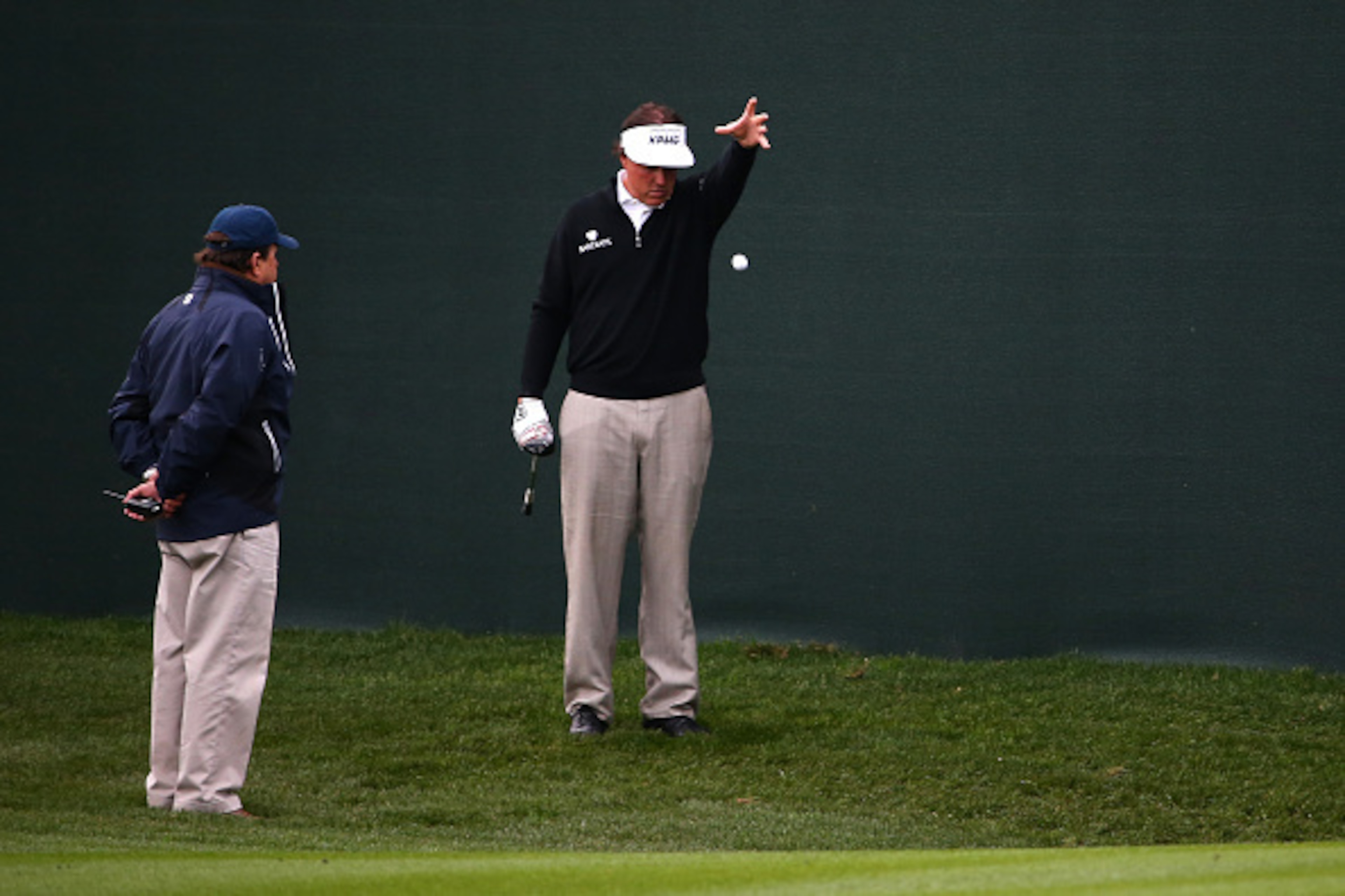 SCOTTSDALE, AZ - JANUARY 29: Phil Mickelson takes a drop on the 10th hole during the first round of the Waste Management Phoenix Open at TPC Scottsdale on January 29, 2015 in Scottsdale, Arizona.  (Photo by Maddie Meyer/Getty Images)