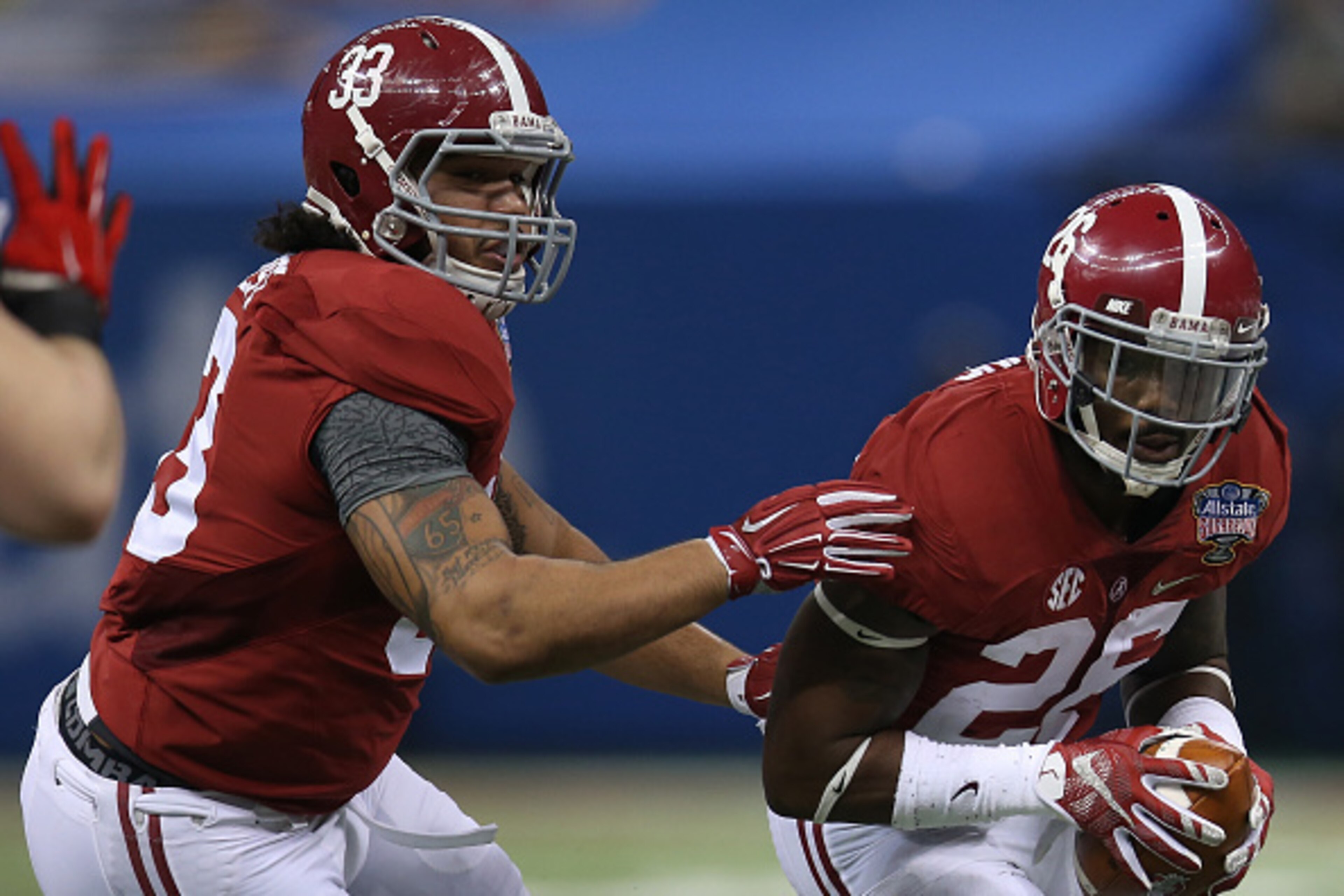 NEW ORLEANS, LA - JANUARY 01:  Landon Collins #26 of the Alabama Crimson Tide recovers a ball against the Ohio State Buckeyes during the All State Sugar Bowl at the Mercedes-Benz Superdome on January 1, 2015 in New Orleans, Louisiana.  (Photo by Chris Gra