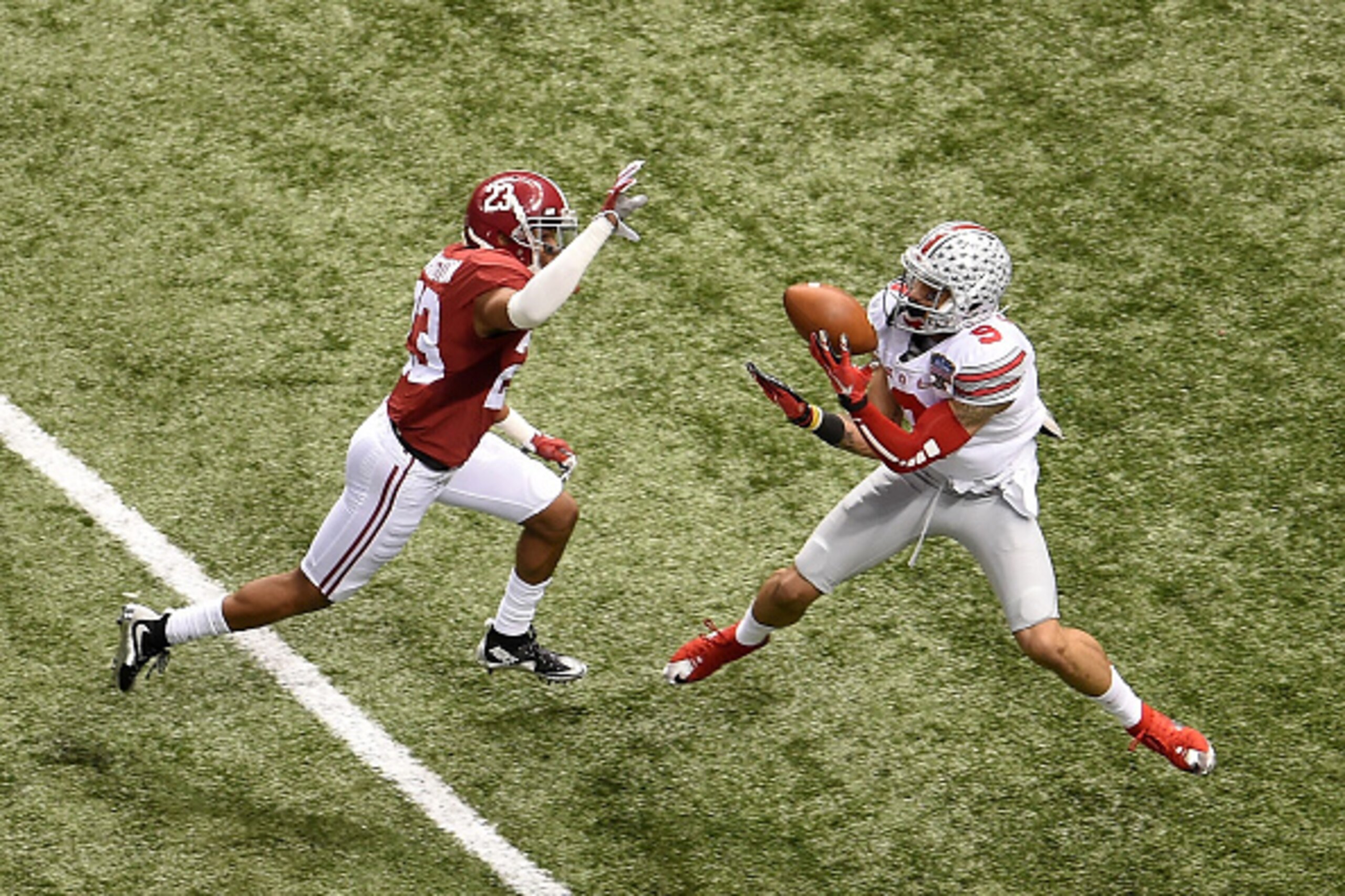 NEW ORLEANS, LA - JANUARY 01:  Devin Smith #9 of the Ohio State Buckeyes completes a reception against the Alabama Crimson Tide during the All State Sugar Bowl at the Mercedes-Benz Superdome on January 1, 2015 in New Orleans, Louisiana.  (Photo by Stacy R